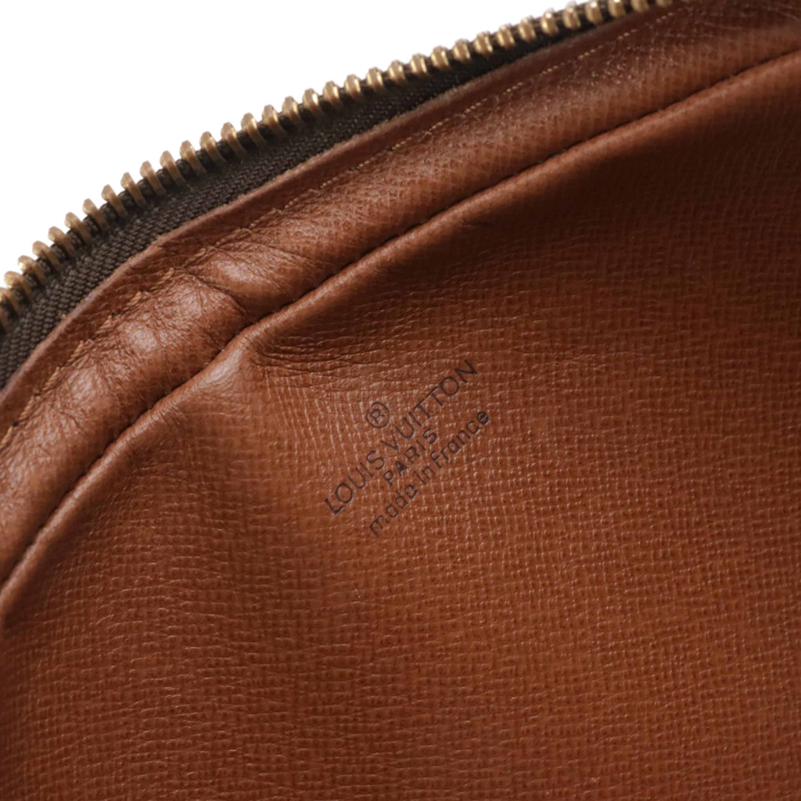 Louis Vuitton Marly Dragonne Wristlet Clutch in Monogram Canvas