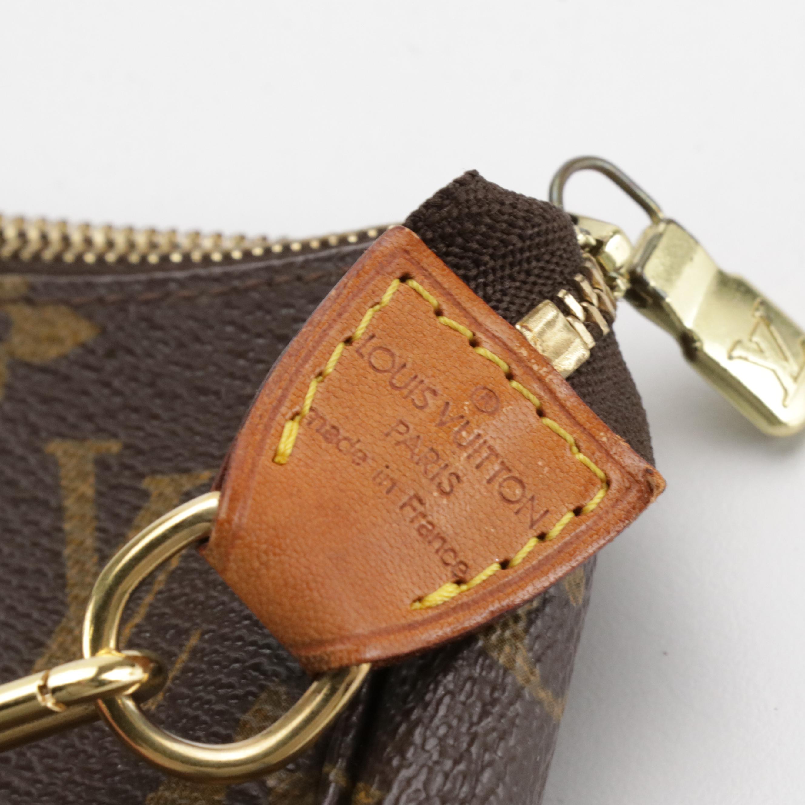 Louis Vuitton Pochette Accessoires Bag in Monogram Canvas and Leather Trim