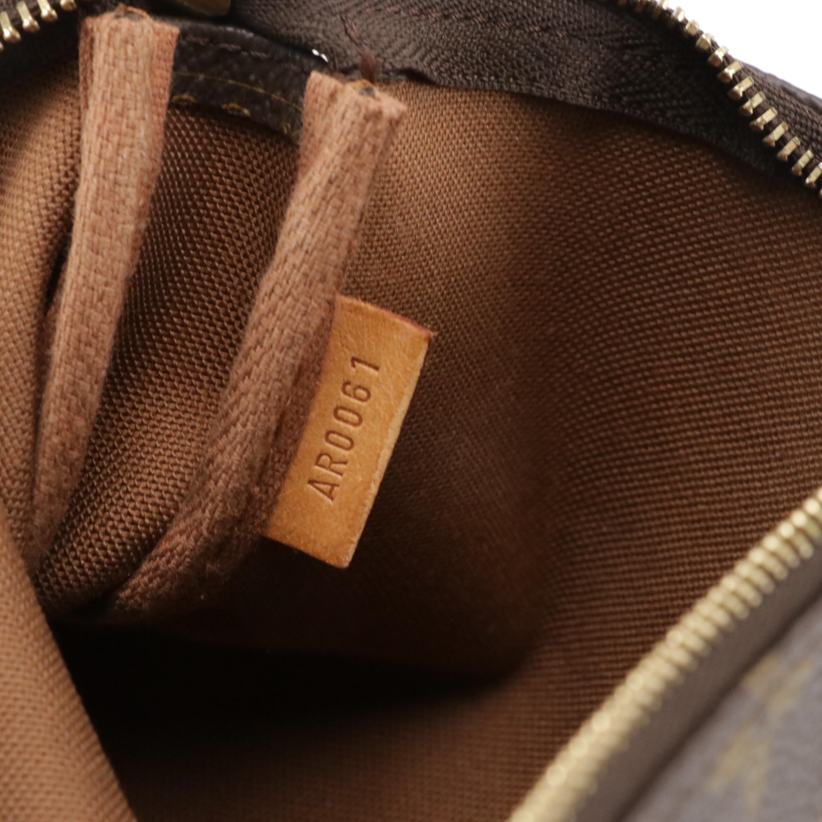 Louis Vuitton Pochette Accessoires Bag in Monogram Canvas and Leather Trim