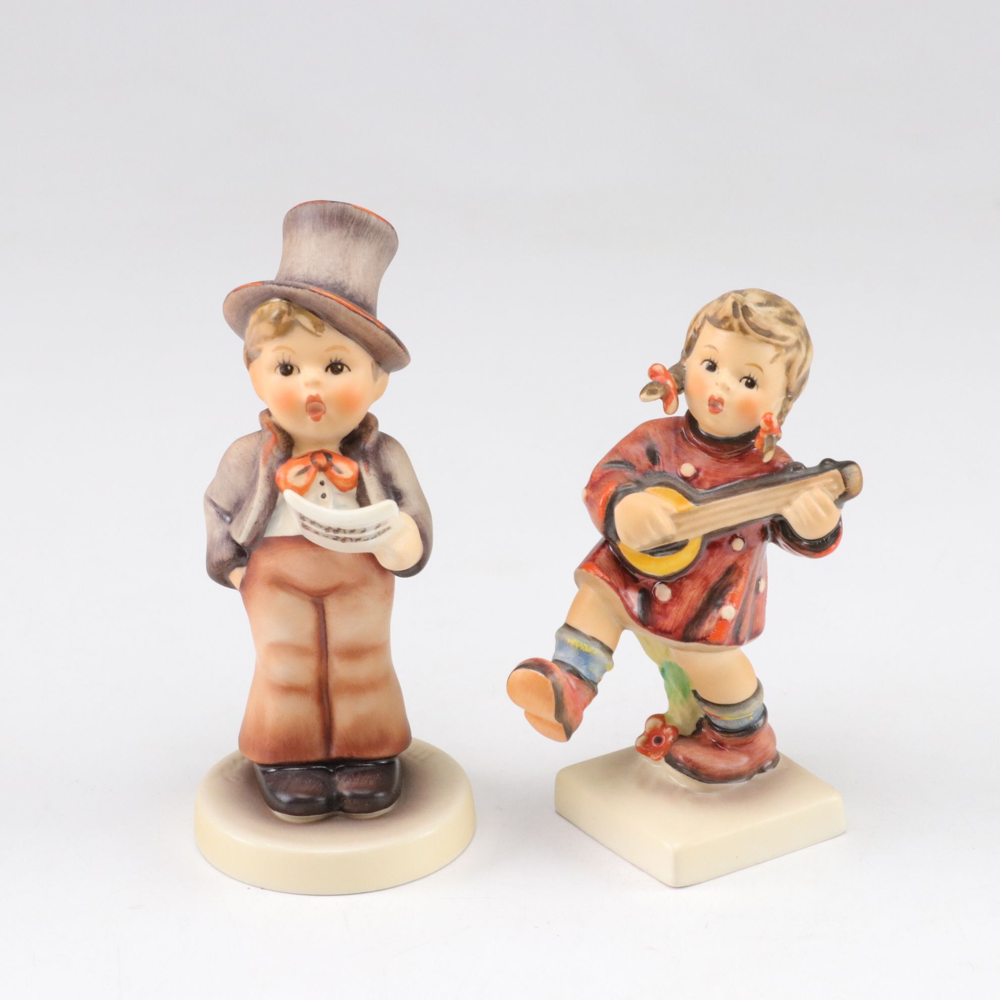 Goebel "Street Singer" and Other Porcelain Hummel Figurines