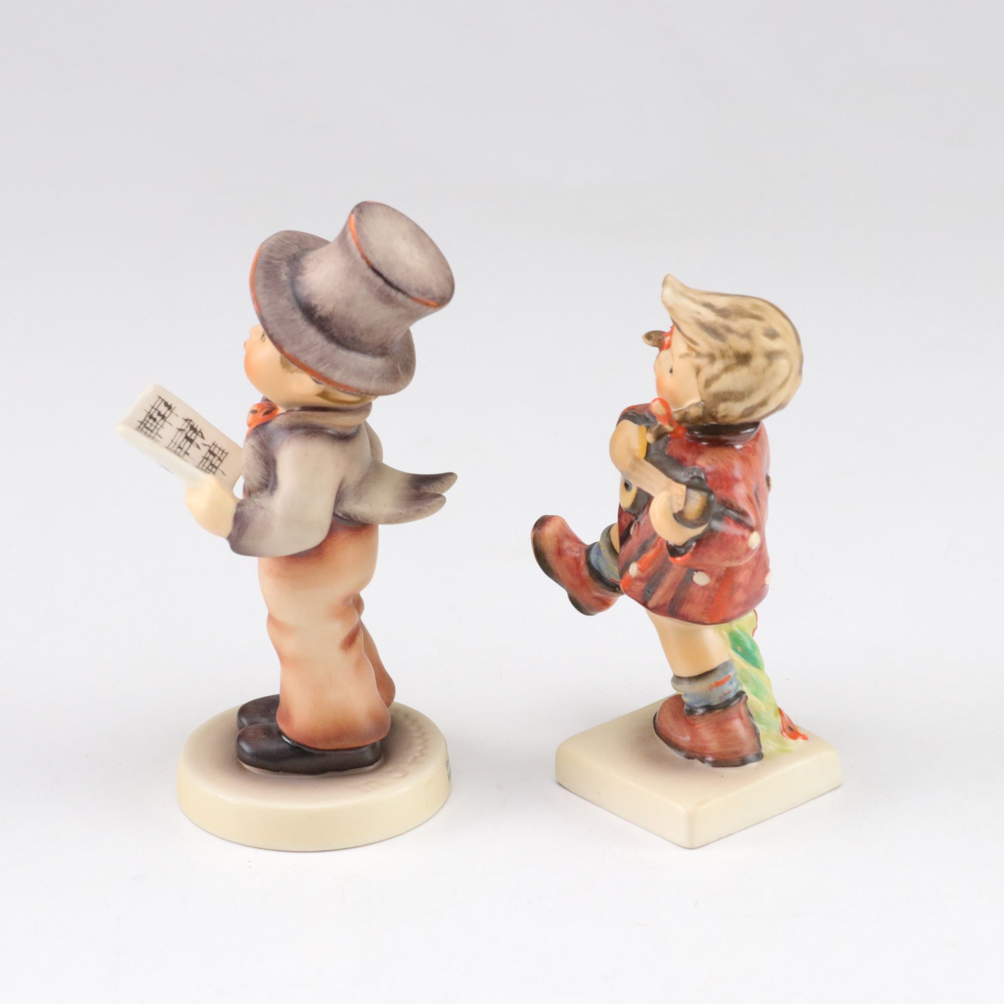 Goebel "Street Singer" and Other Porcelain Hummel Figurines