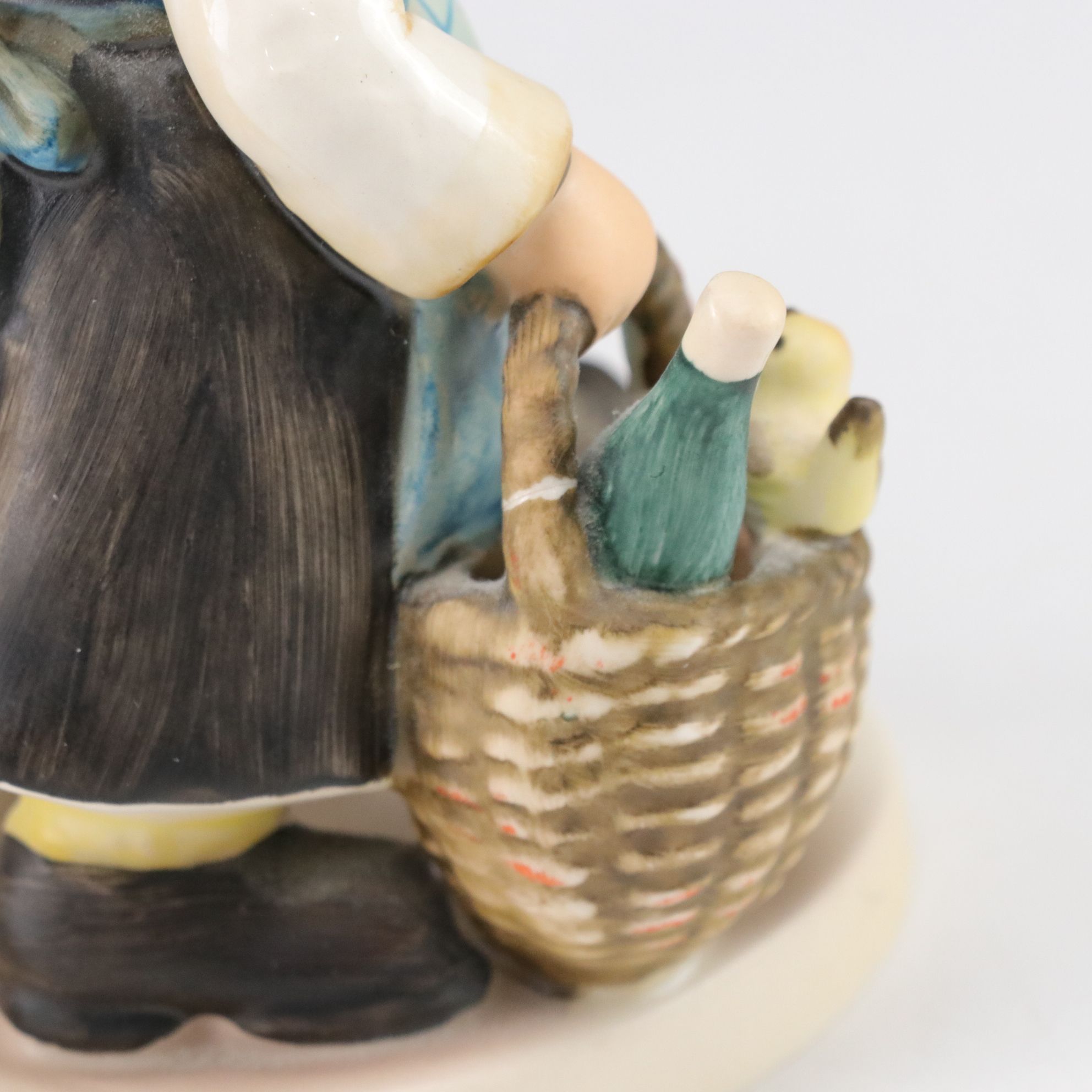 Goebel "Street Singer" and Other Porcelain Hummel Figurines