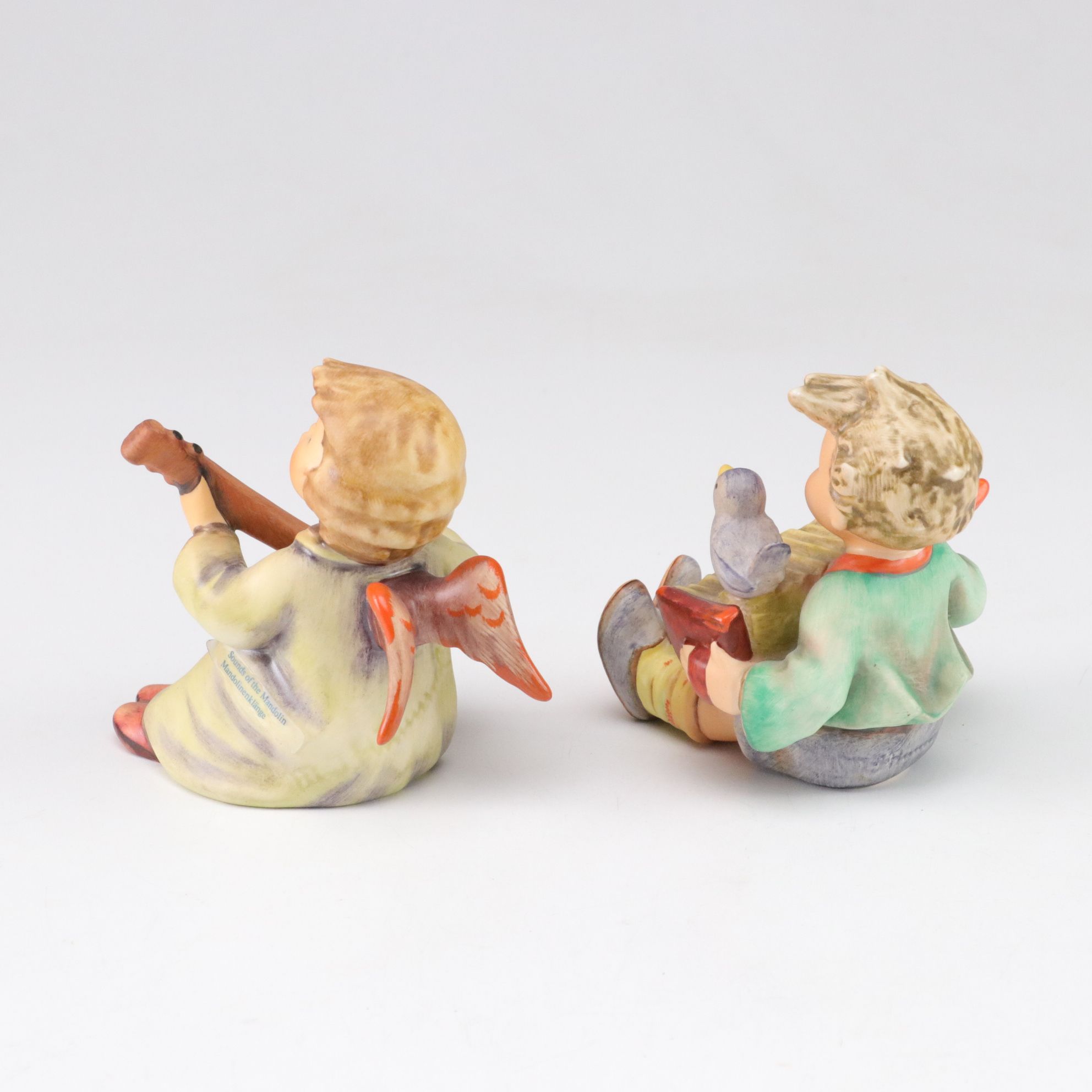 Goebel "Street Singer" and Other Porcelain Hummel Figurines