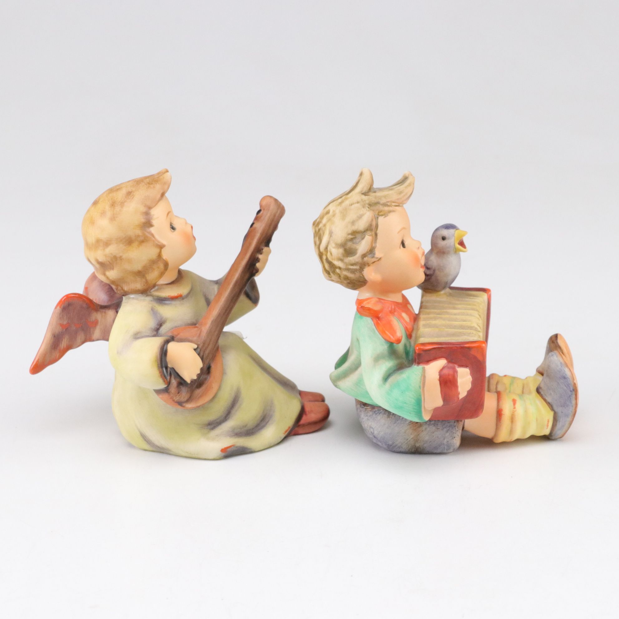 Goebel "Street Singer" and Other Porcelain Hummel Figurines