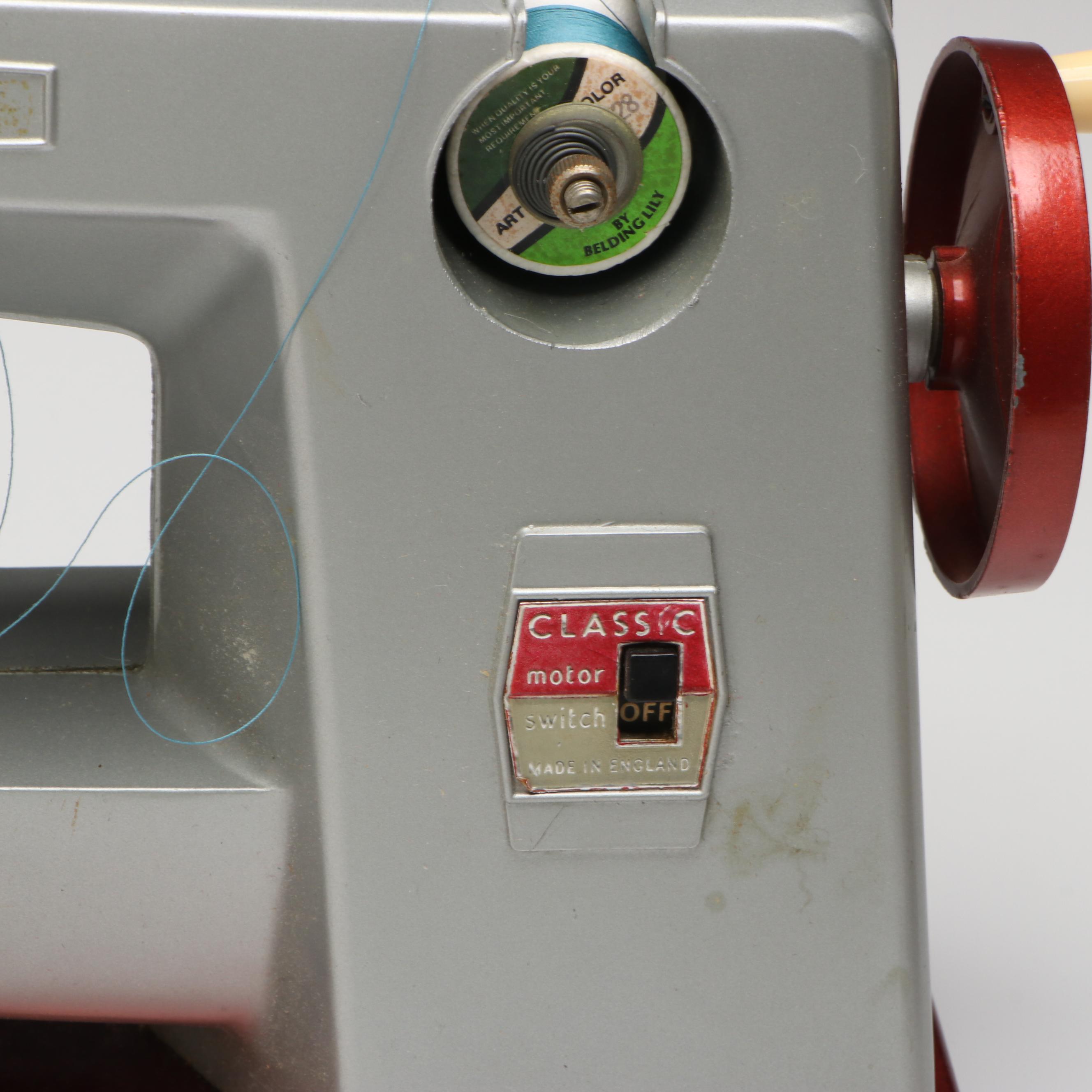 Vulcan Battery Powered Sewing Machine with Tin of Buttons and Pincushion