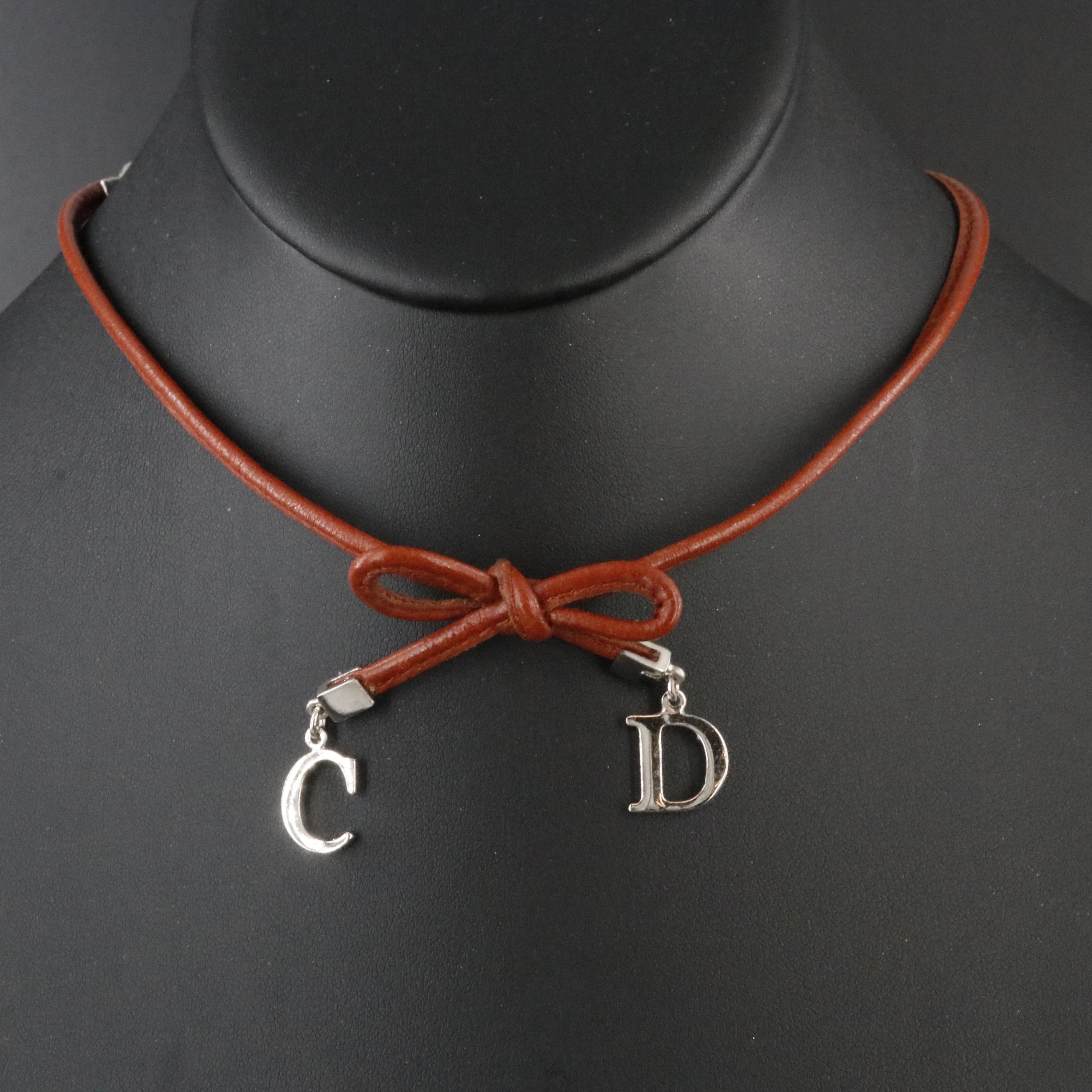 Christian Dior CD Faux Leather Bow Necklace