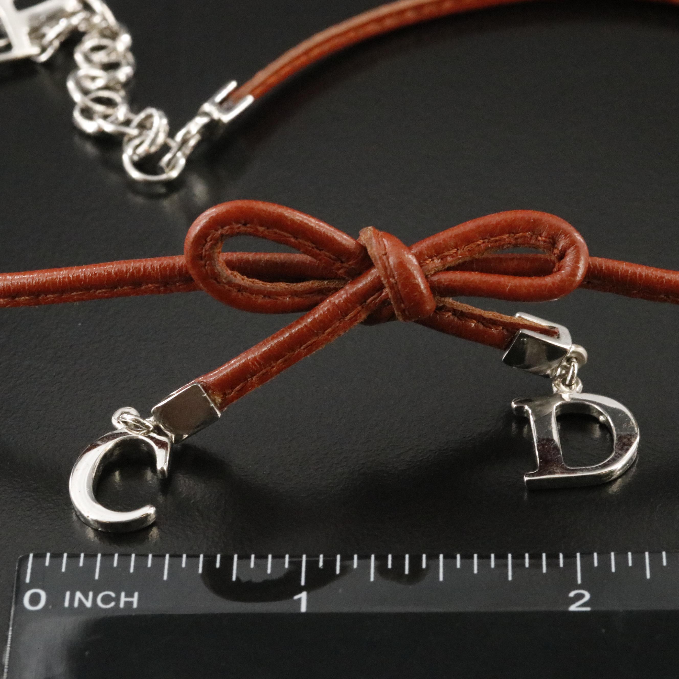 Christian Dior CD Faux Leather Bow Necklace