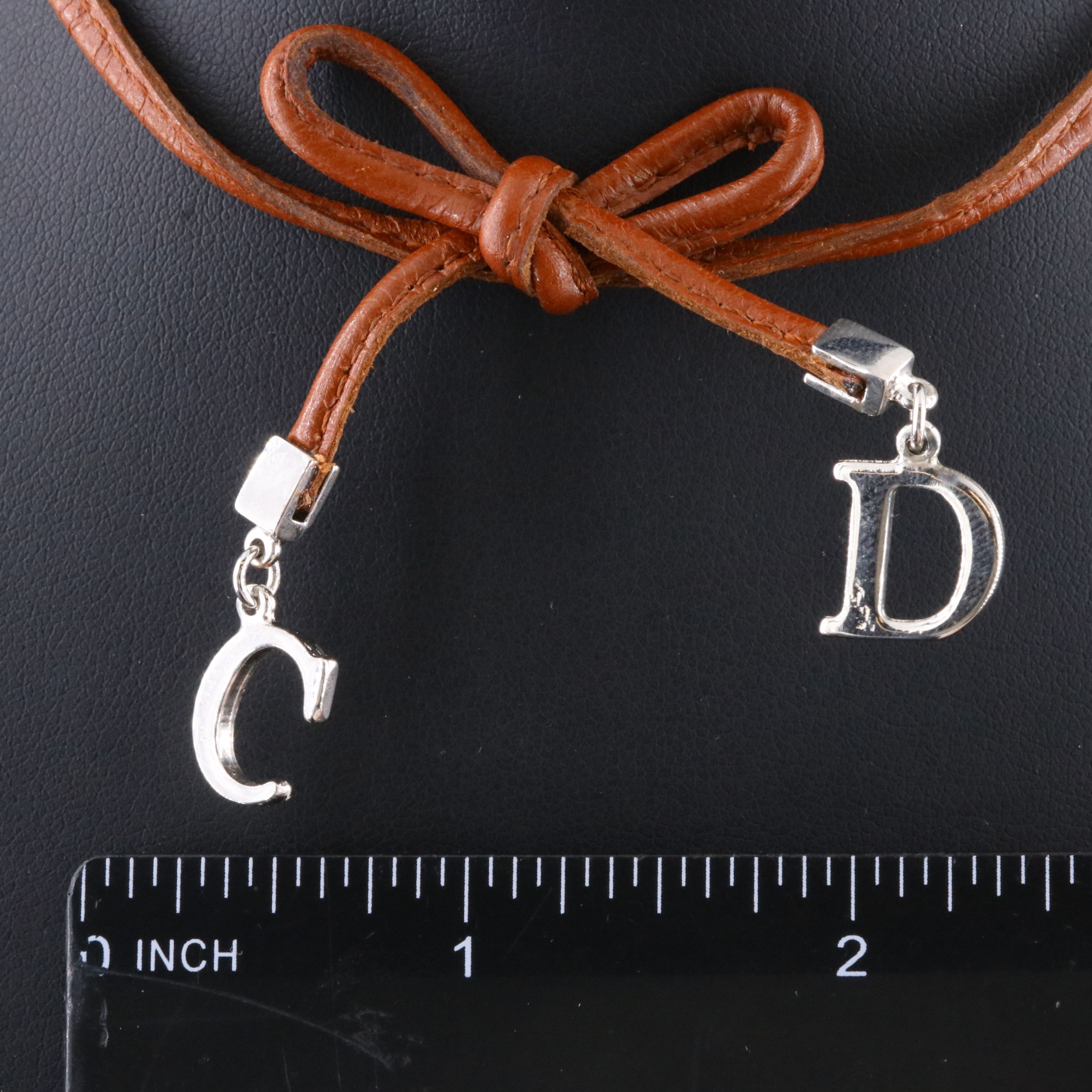 Christian Dior CD Faux Leather Bow Necklace