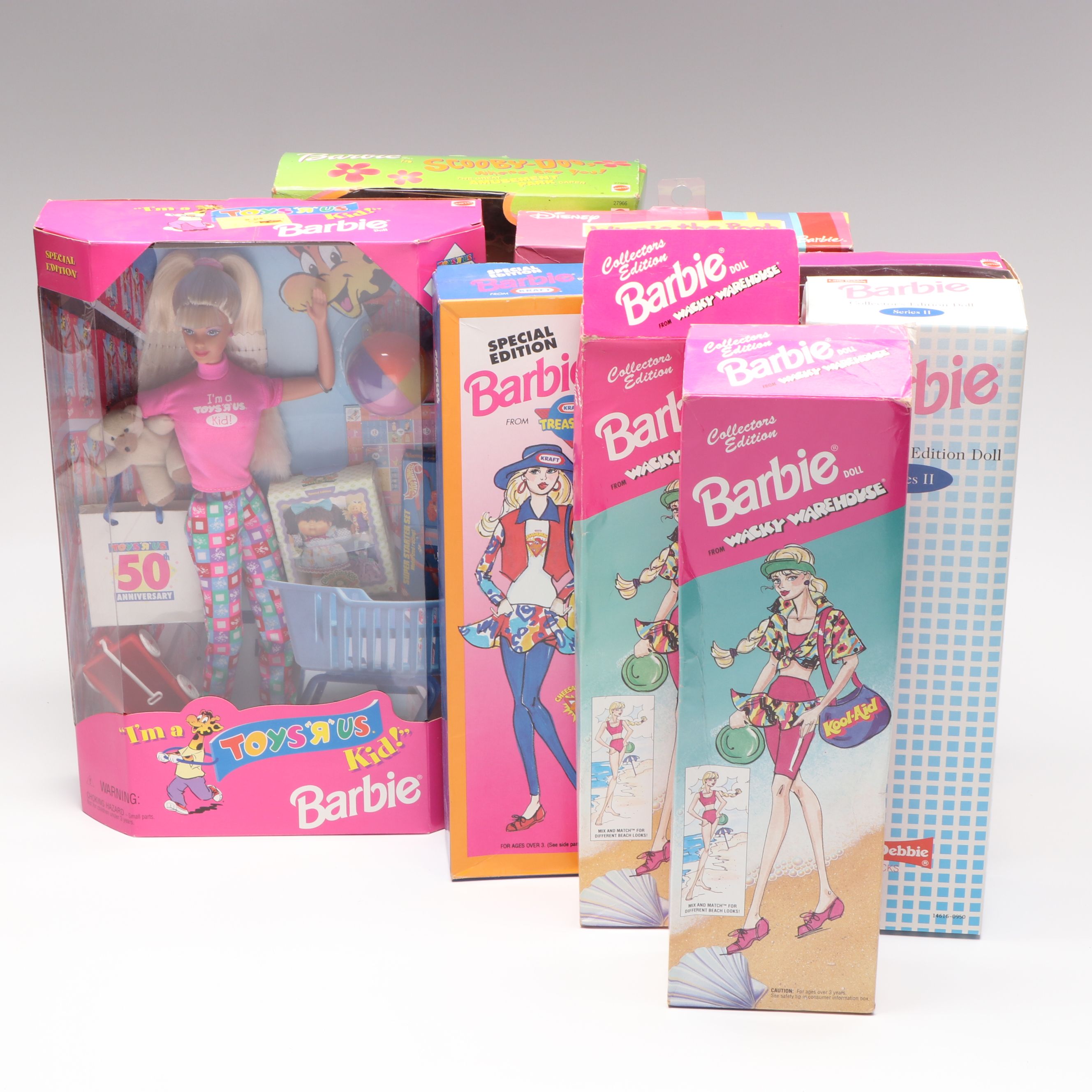 Barbie "Winnie the Pooh" Doll with Other Barbie Dolls