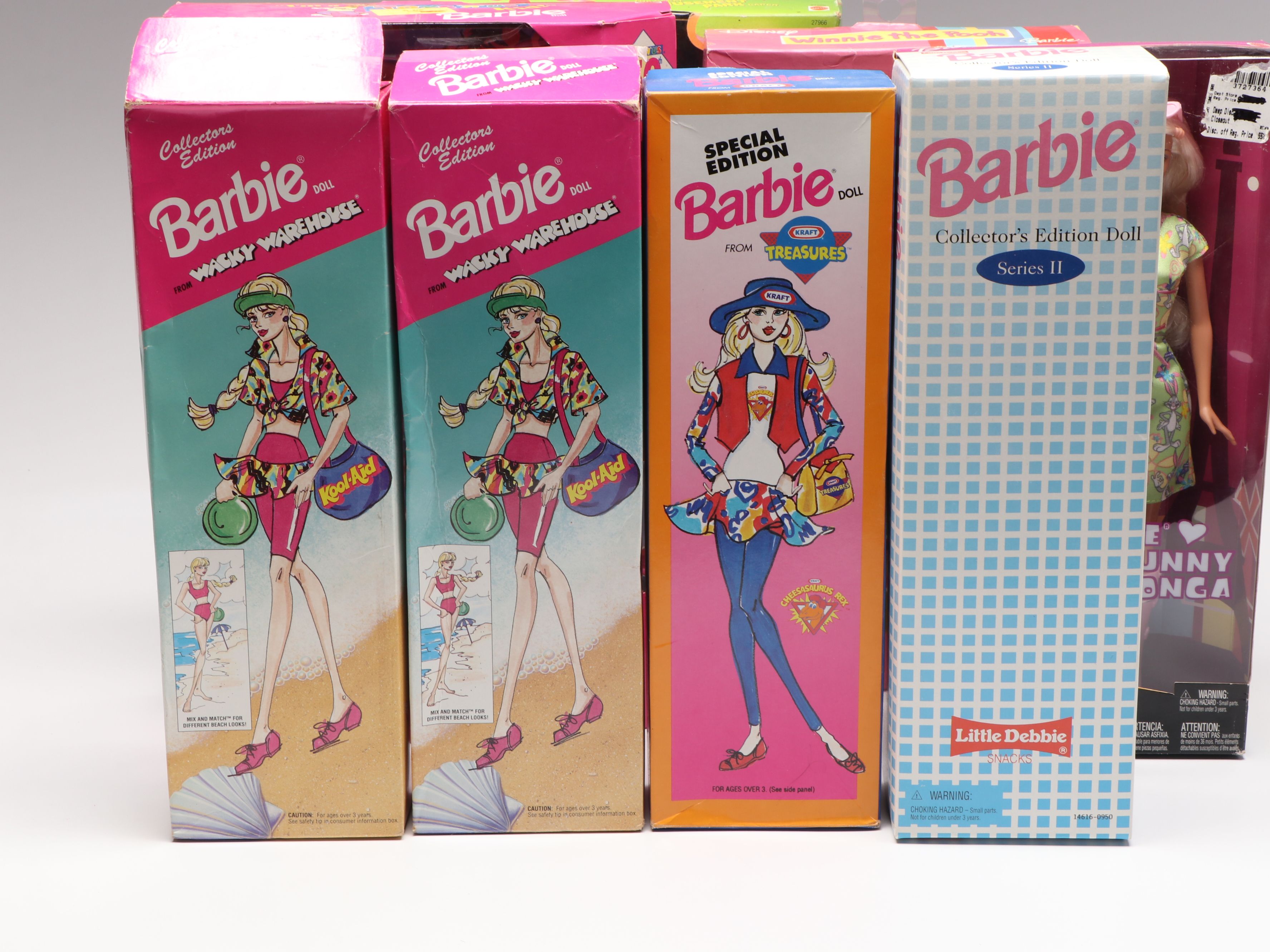 Barbie "Winnie the Pooh" Doll with Other Barbie Dolls