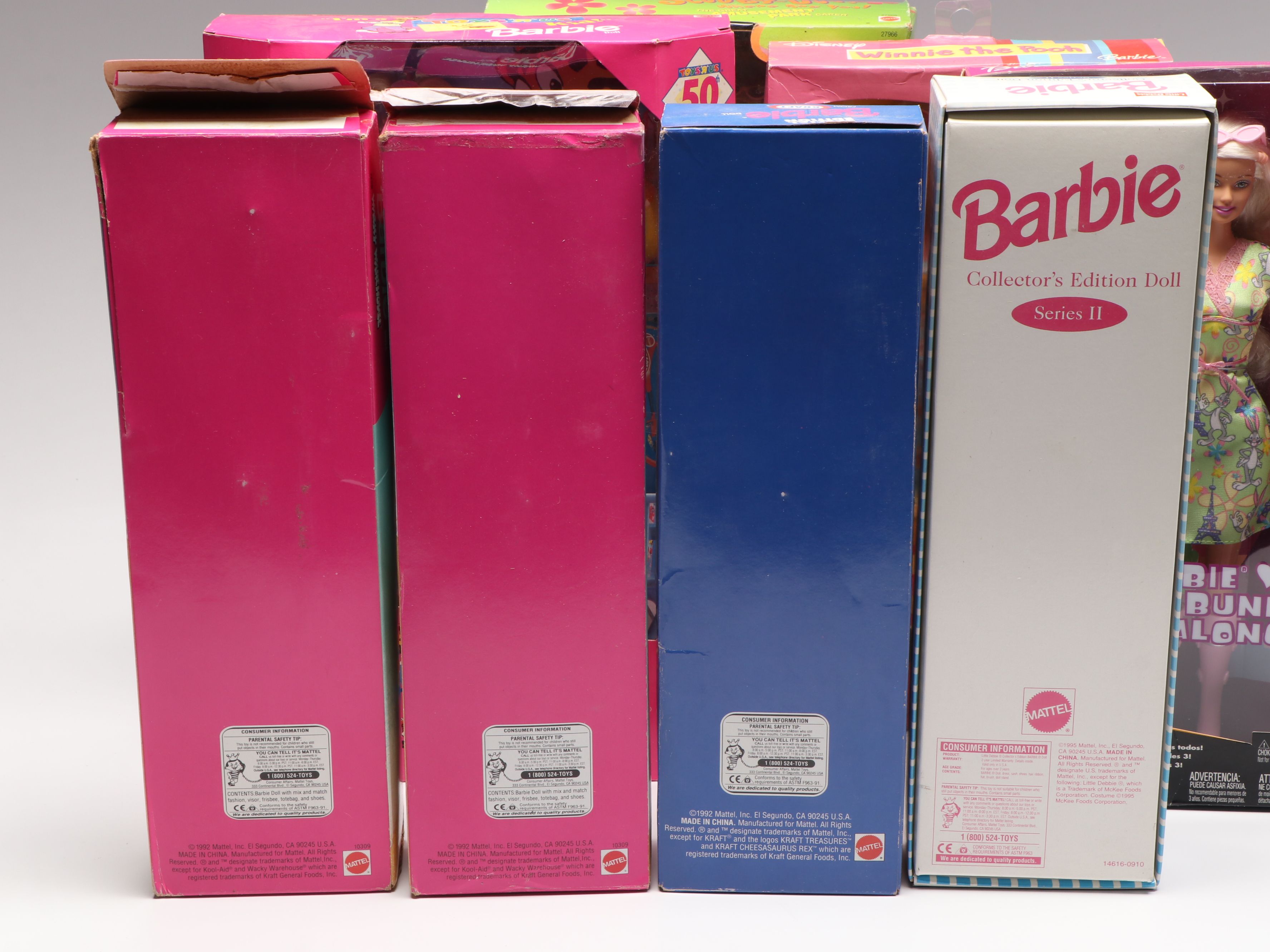 Barbie "Winnie the Pooh" Doll with Other Barbie Dolls