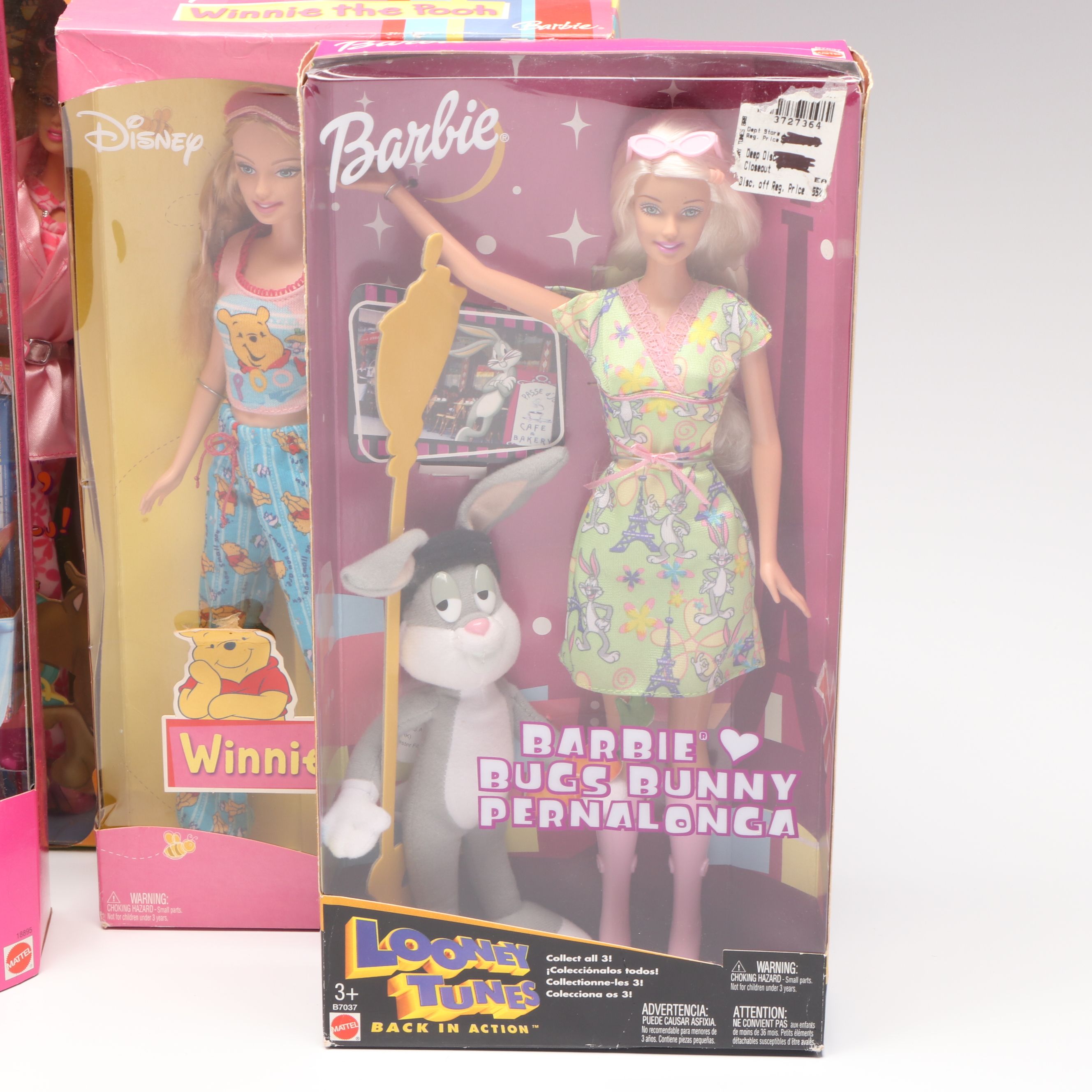 Barbie "Winnie the Pooh" Doll with Other Barbie Dolls