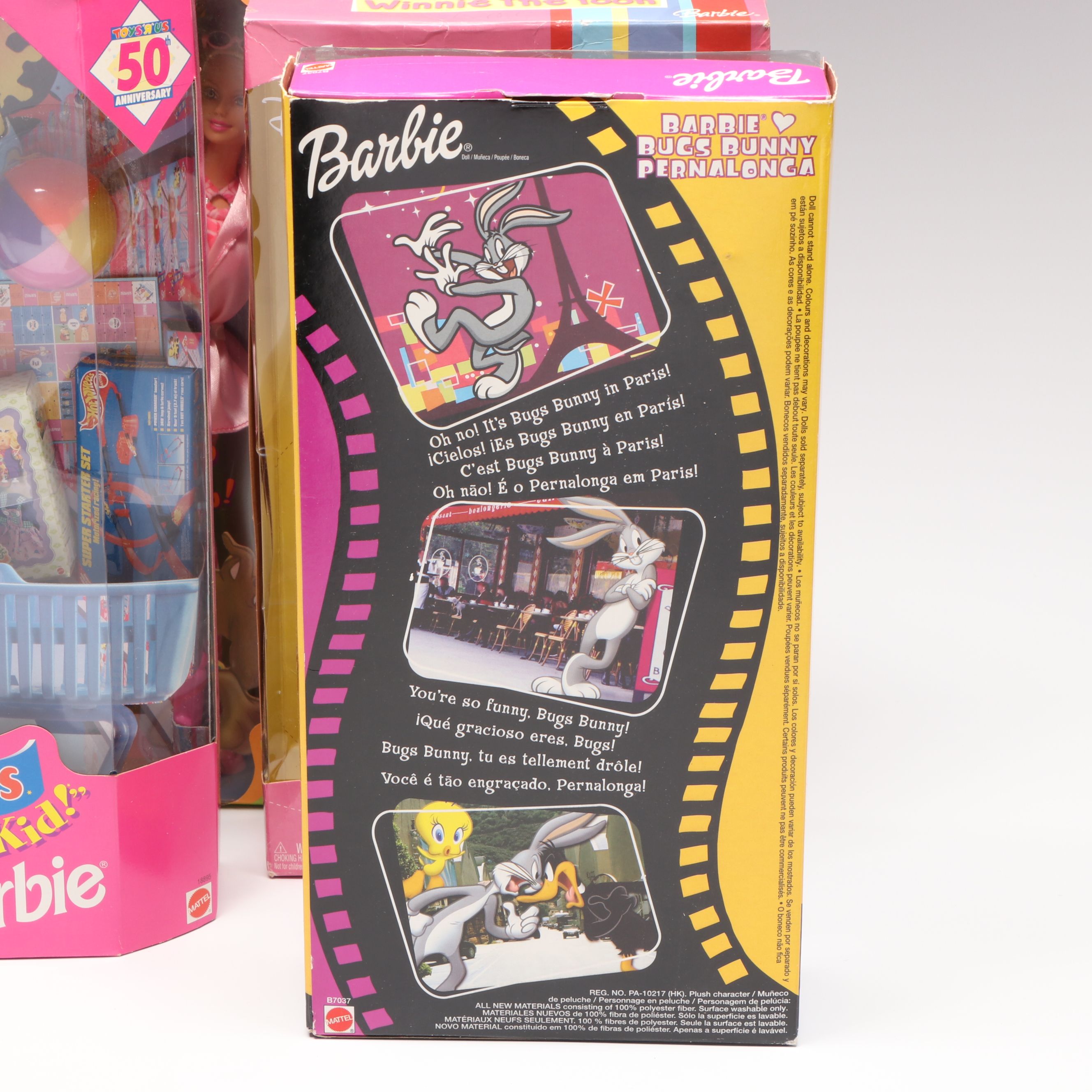 Barbie "Winnie the Pooh" Doll with Other Barbie Dolls