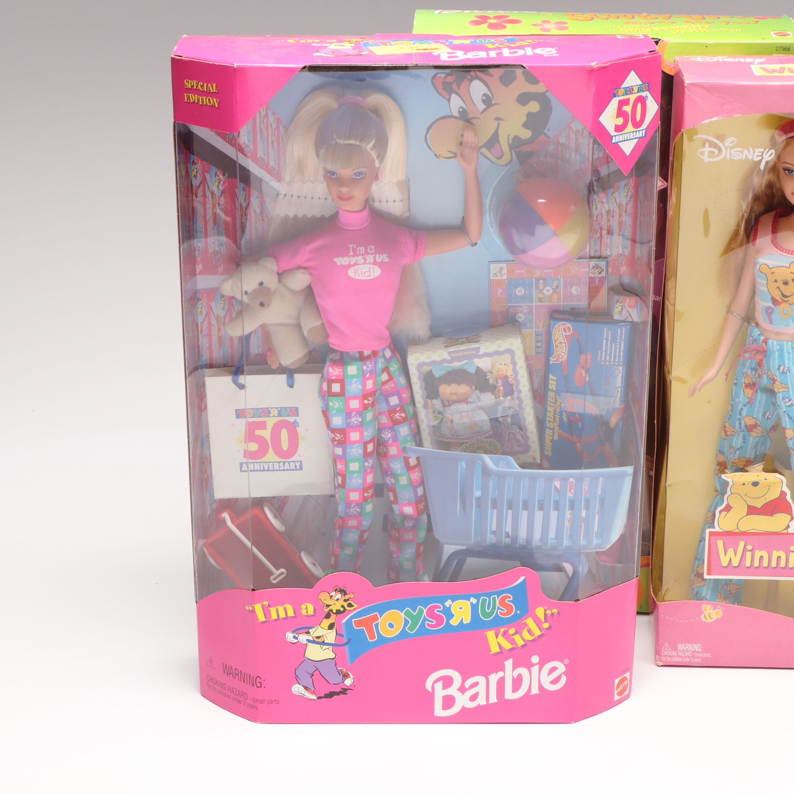 Barbie "Winnie the Pooh" Doll with Other Barbie Dolls