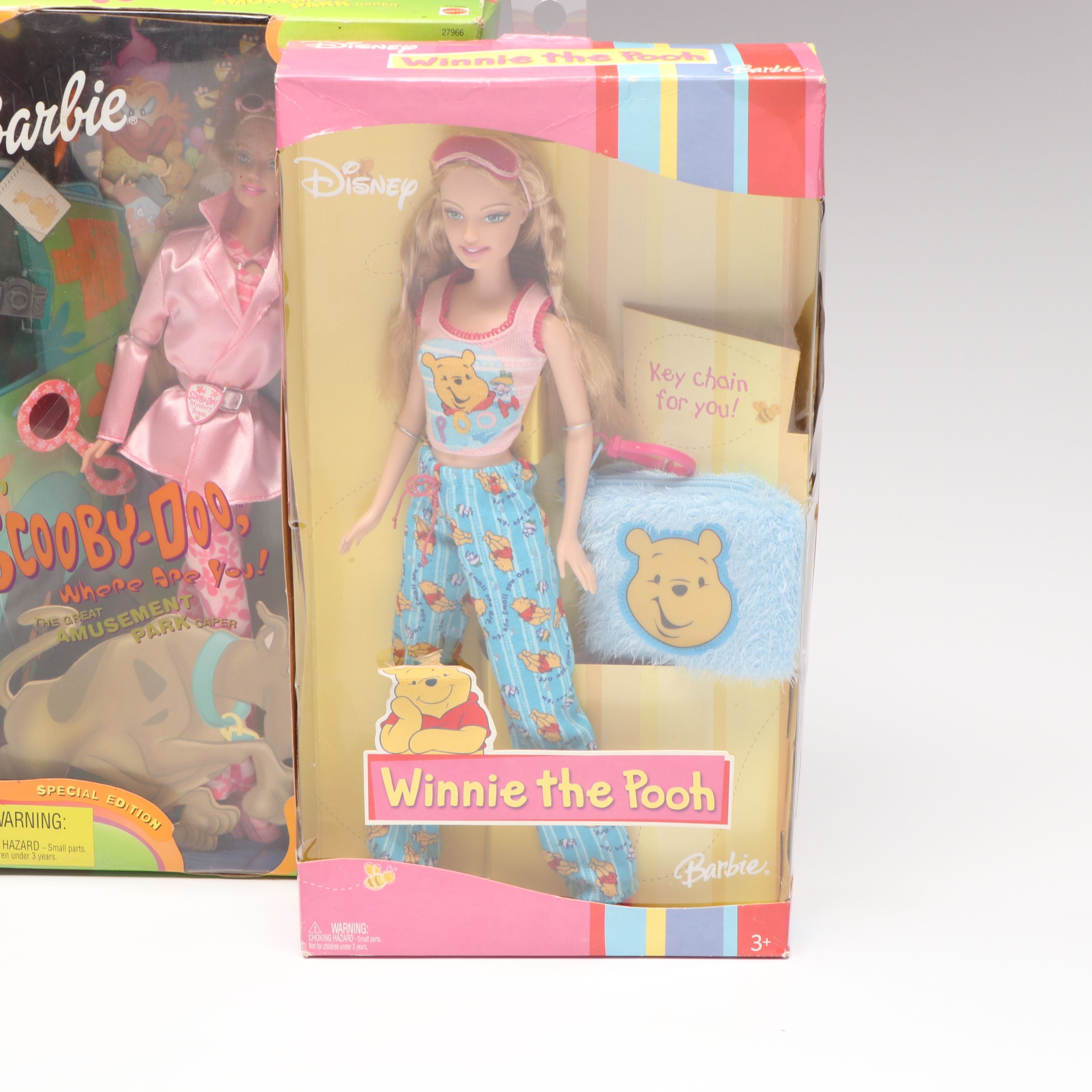 Barbie "Winnie the Pooh" Doll with Other Barbie Dolls