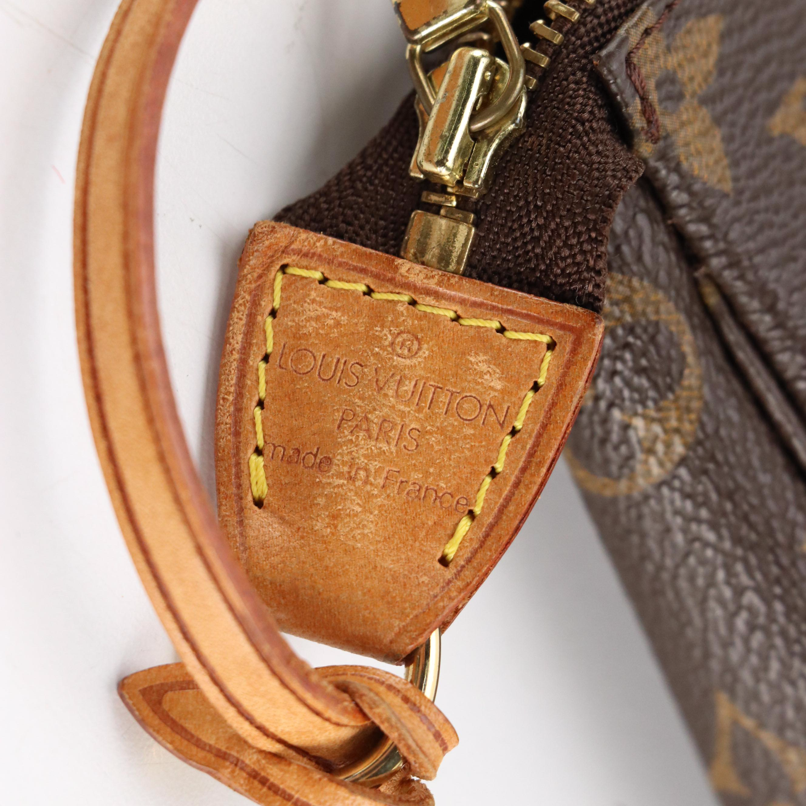 Louis Vuitton Zip Pochette in Monogram Canvas and Vachetta Leather