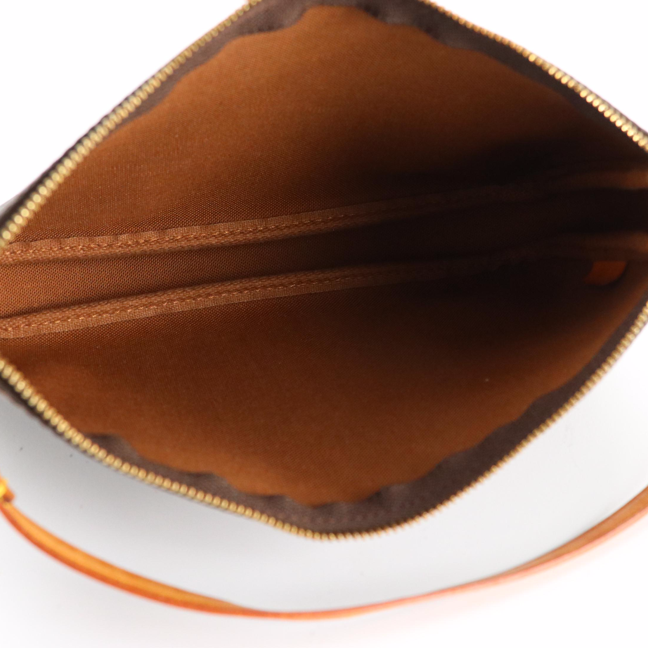 Louis Vuitton Zip Pochette in Monogram Canvas and Vachetta Leather