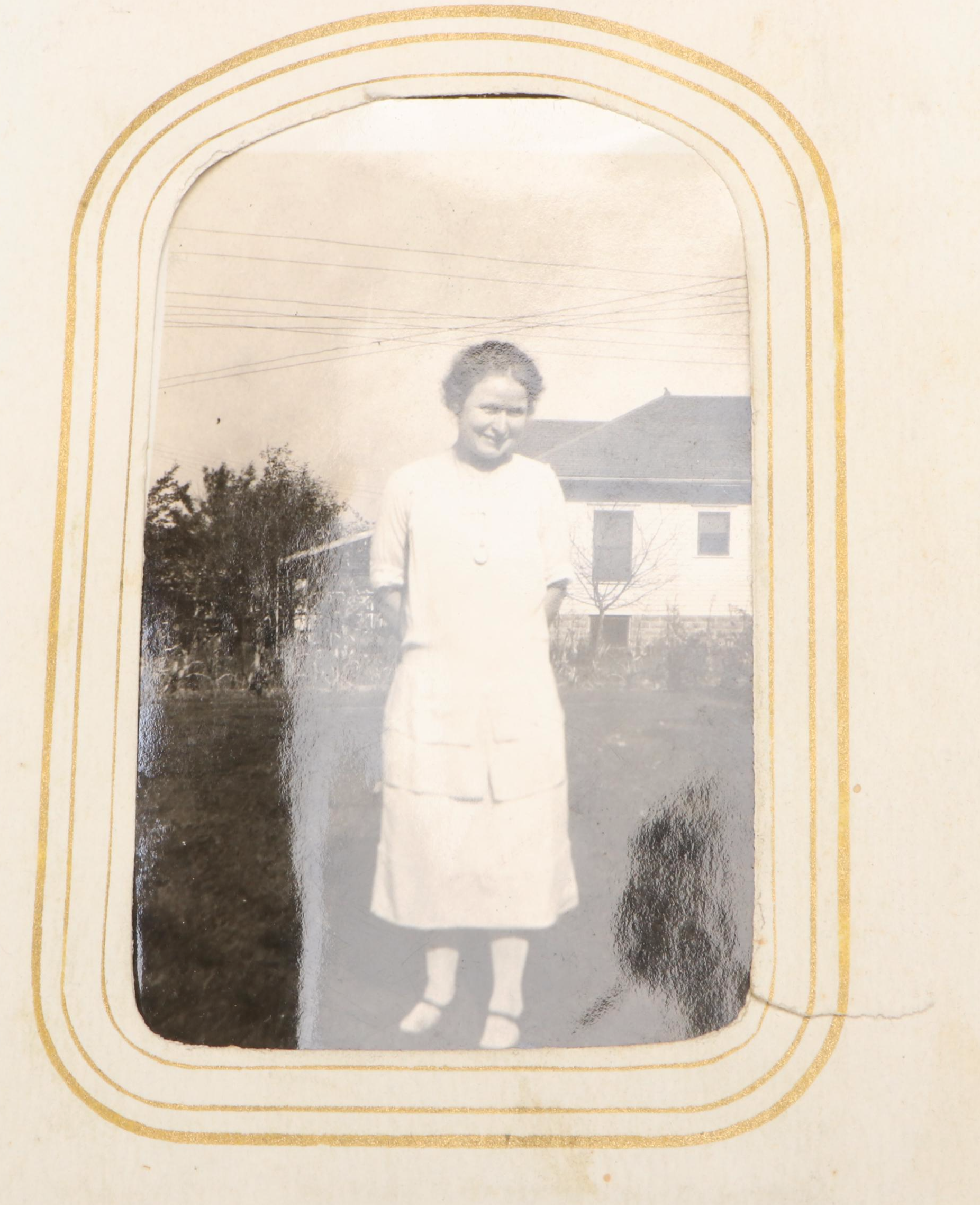 Portraits of Men, Women and Children in Embossed Leather Album