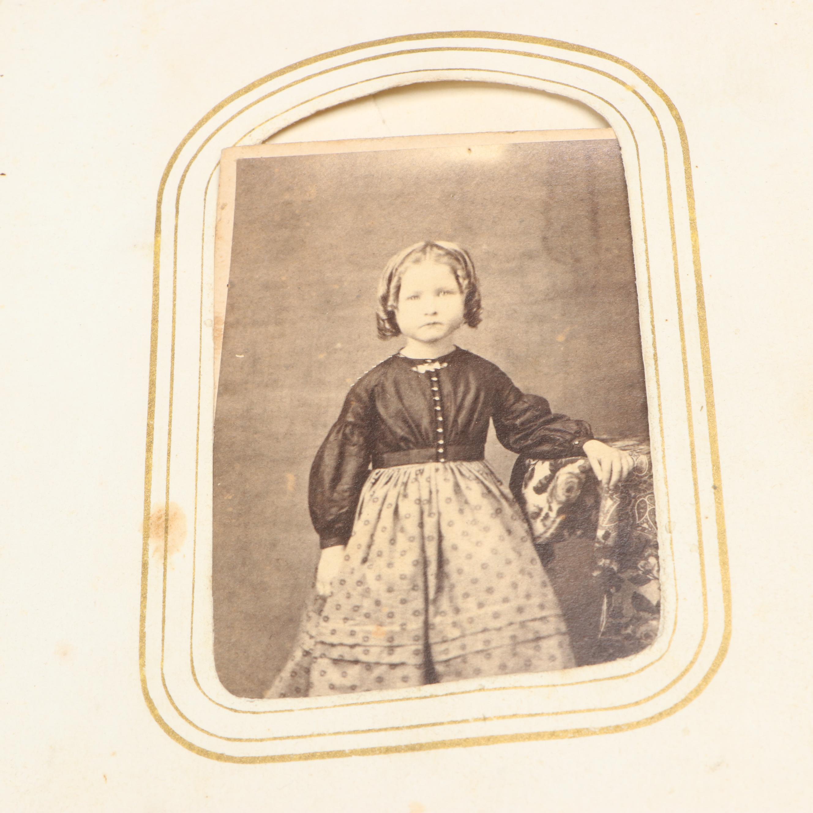 Portraits of Men, Women and Children in Embossed Leather Album