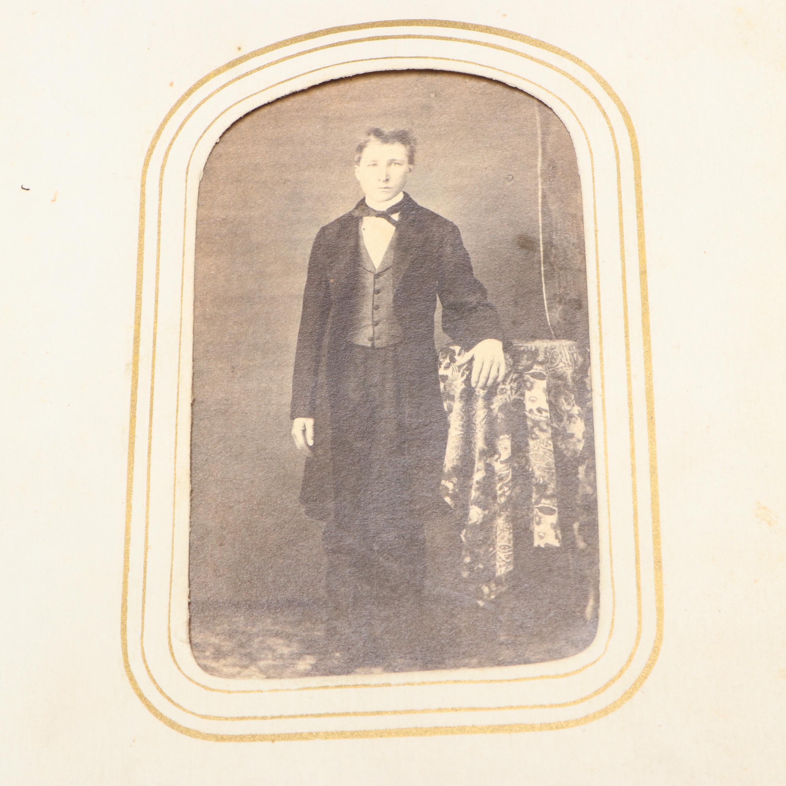 Portraits of Men, Women and Children in Embossed Leather Album