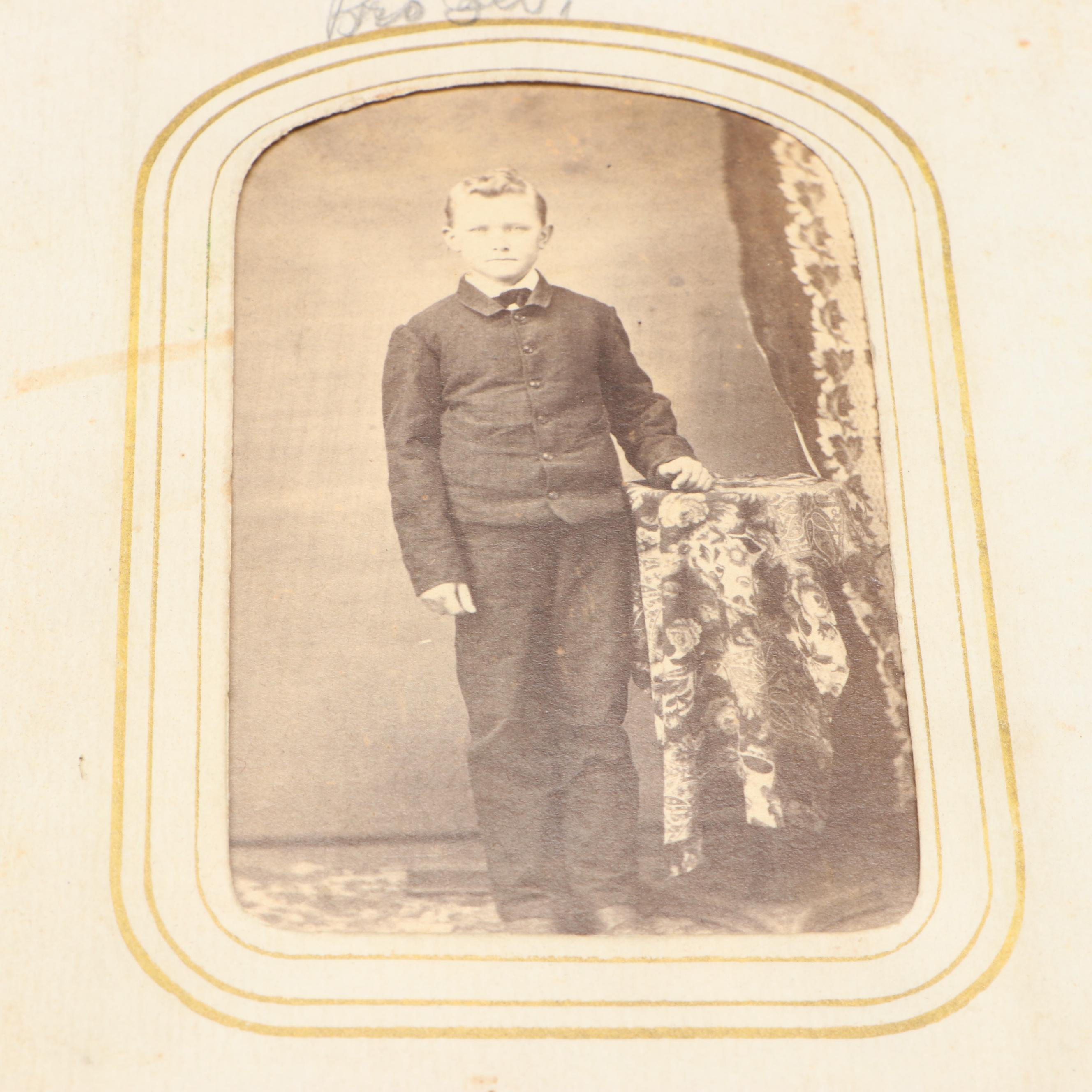 Portraits of Men, Women and Children in Embossed Leather Album