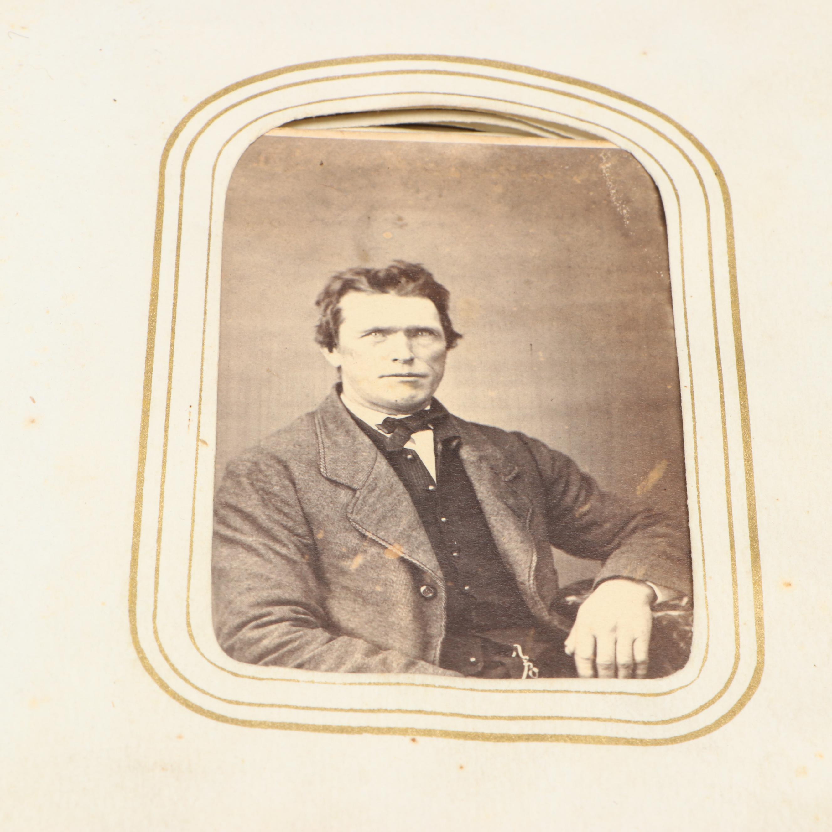 Portraits of Men, Women and Children in Embossed Leather Album