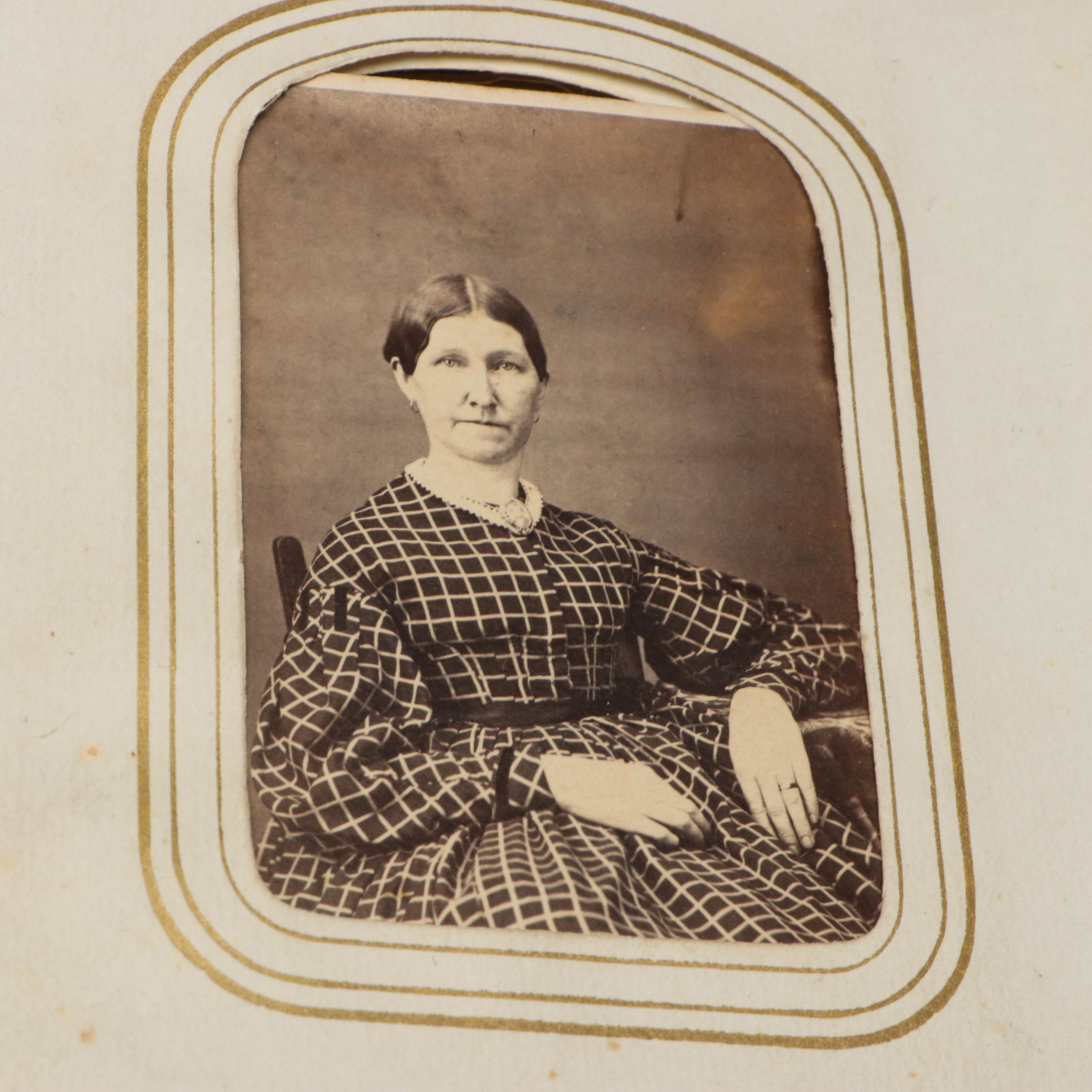 Portraits of Men, Women and Children in Embossed Leather Album