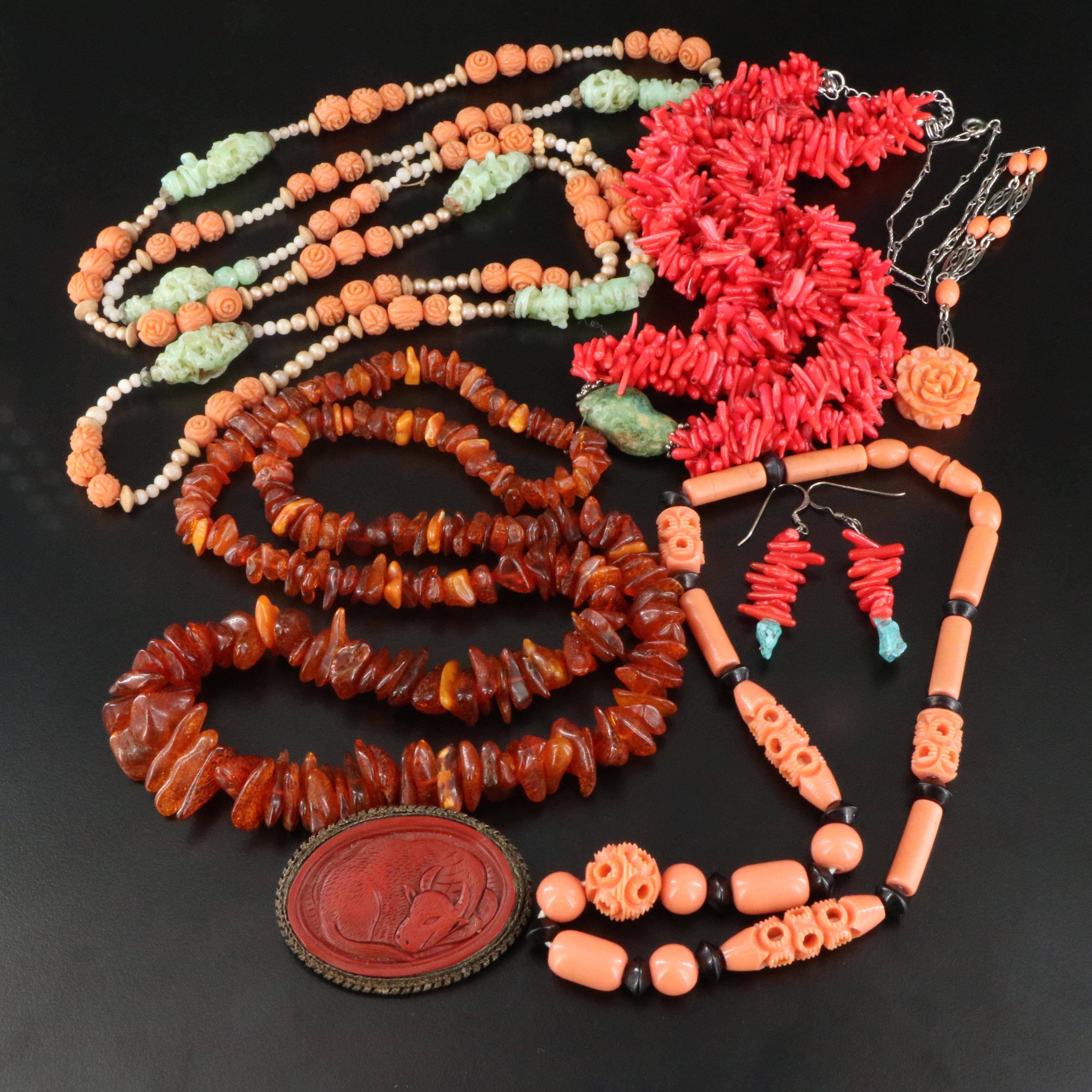 Amber and Faux Cinnabar Featured in Vintage Jewelry