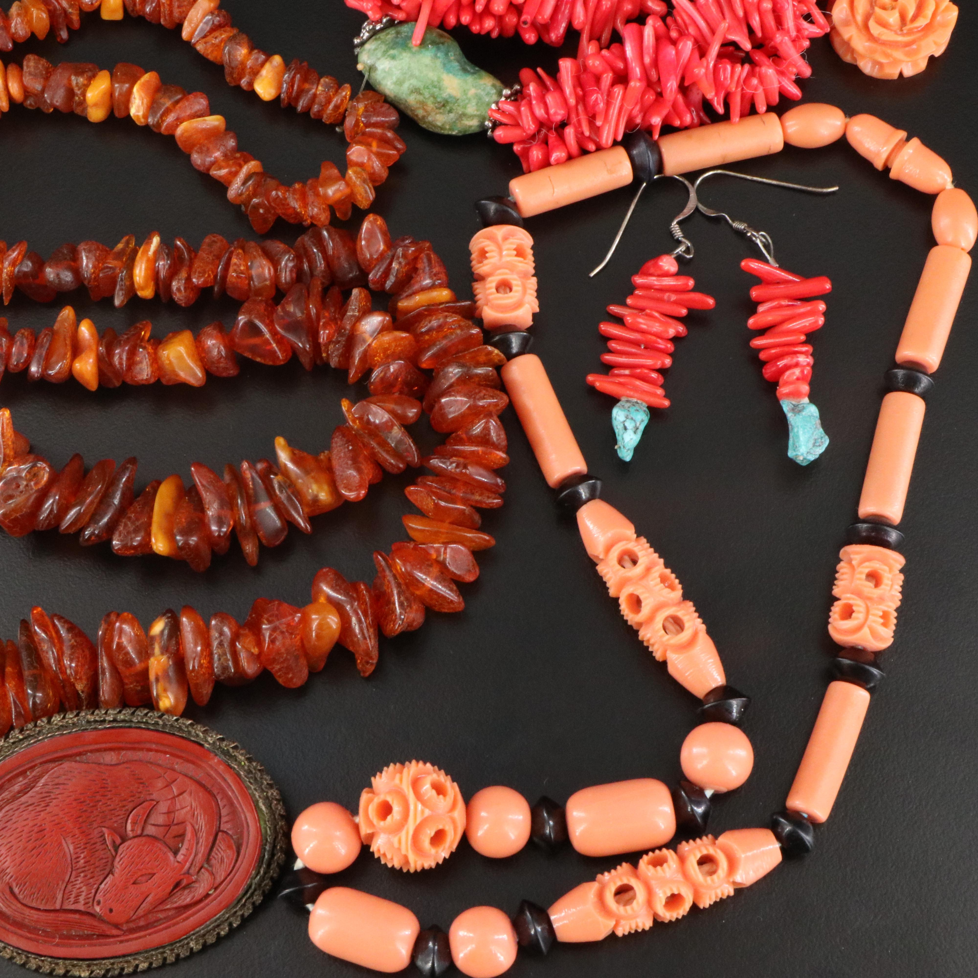Amber and Faux Cinnabar Featured in Vintage Jewelry