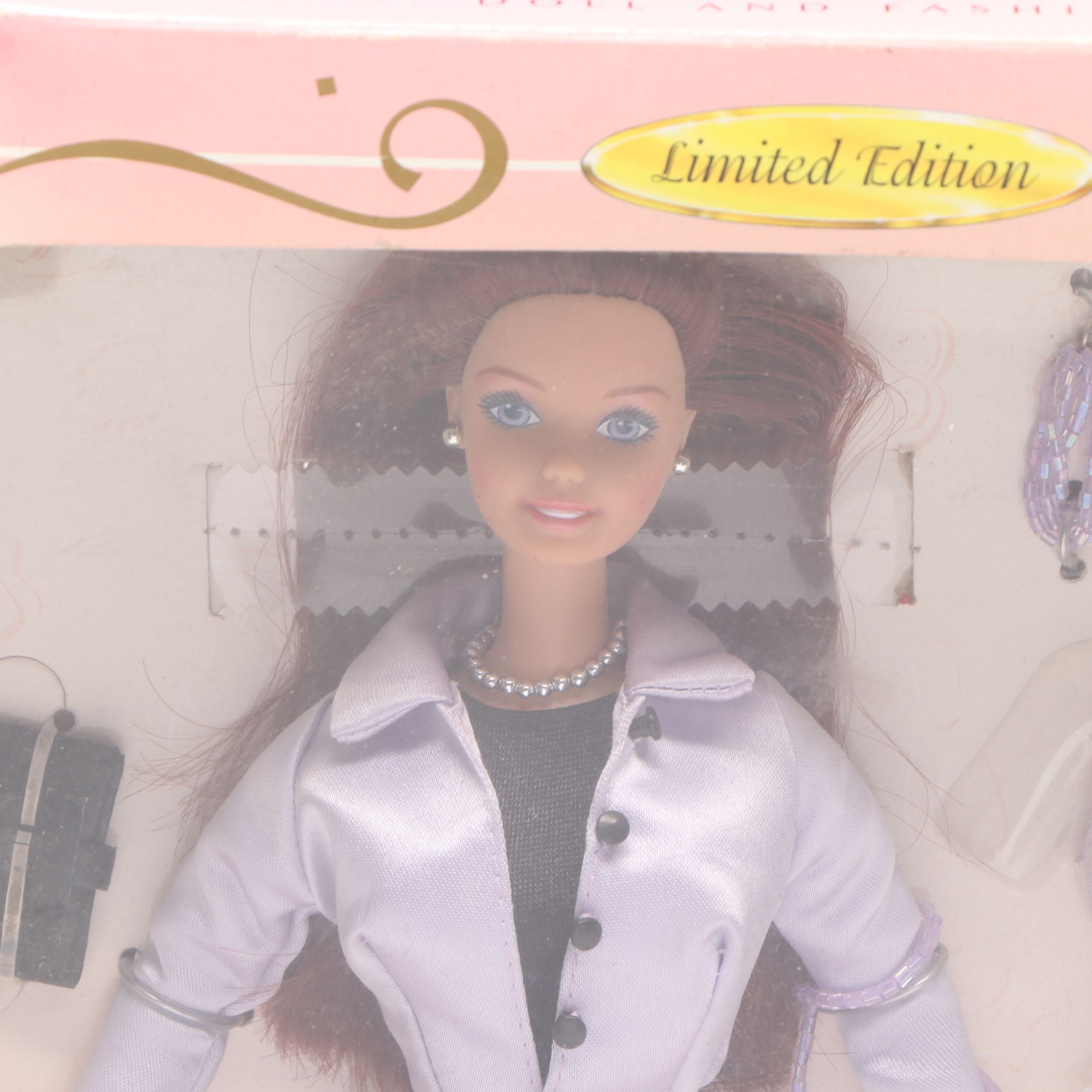 Barbie "Perfectly Suited" and "International Travel" Dolls