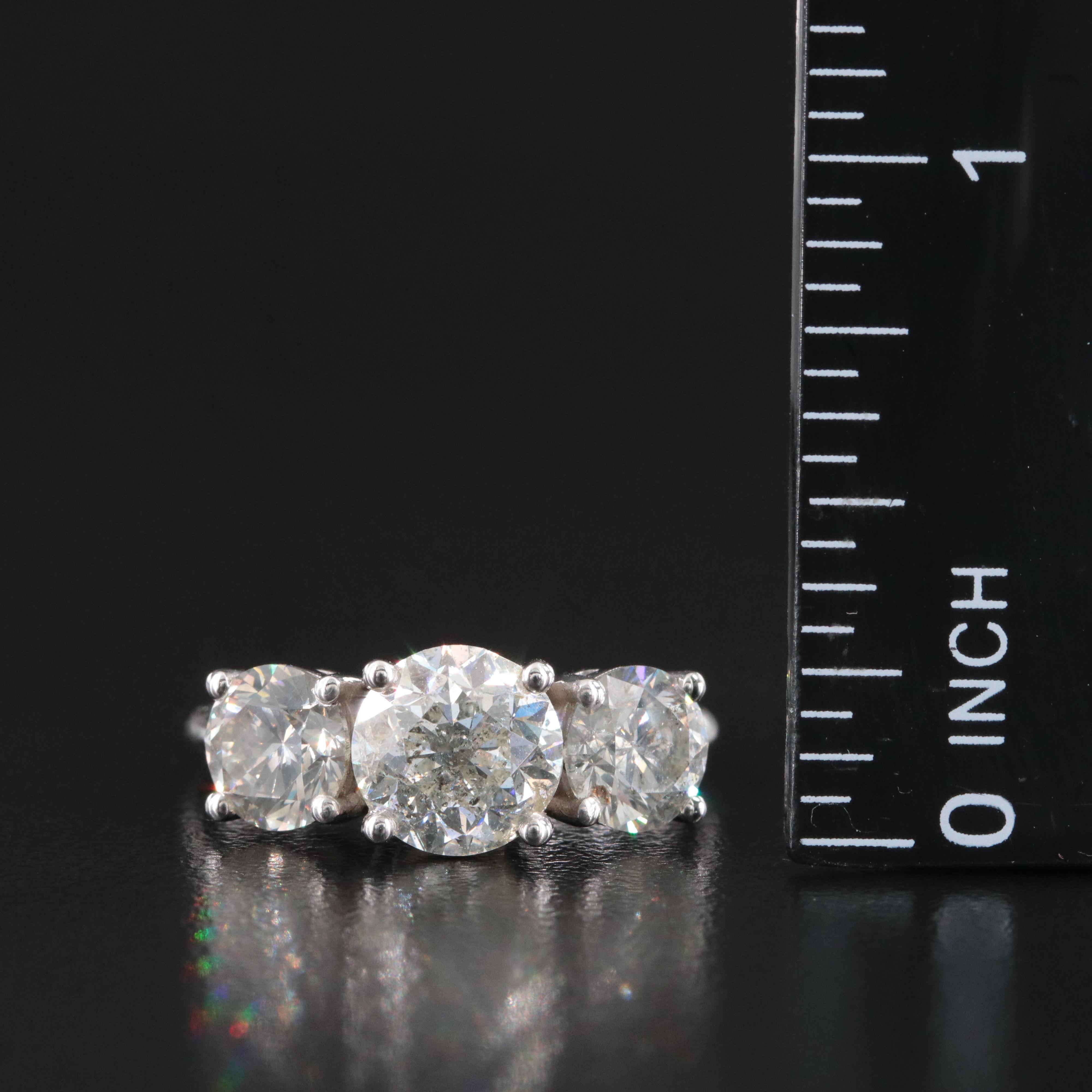 14K 4.26 CTW Diamond Three Stone Ring with IGI Jewelry Report