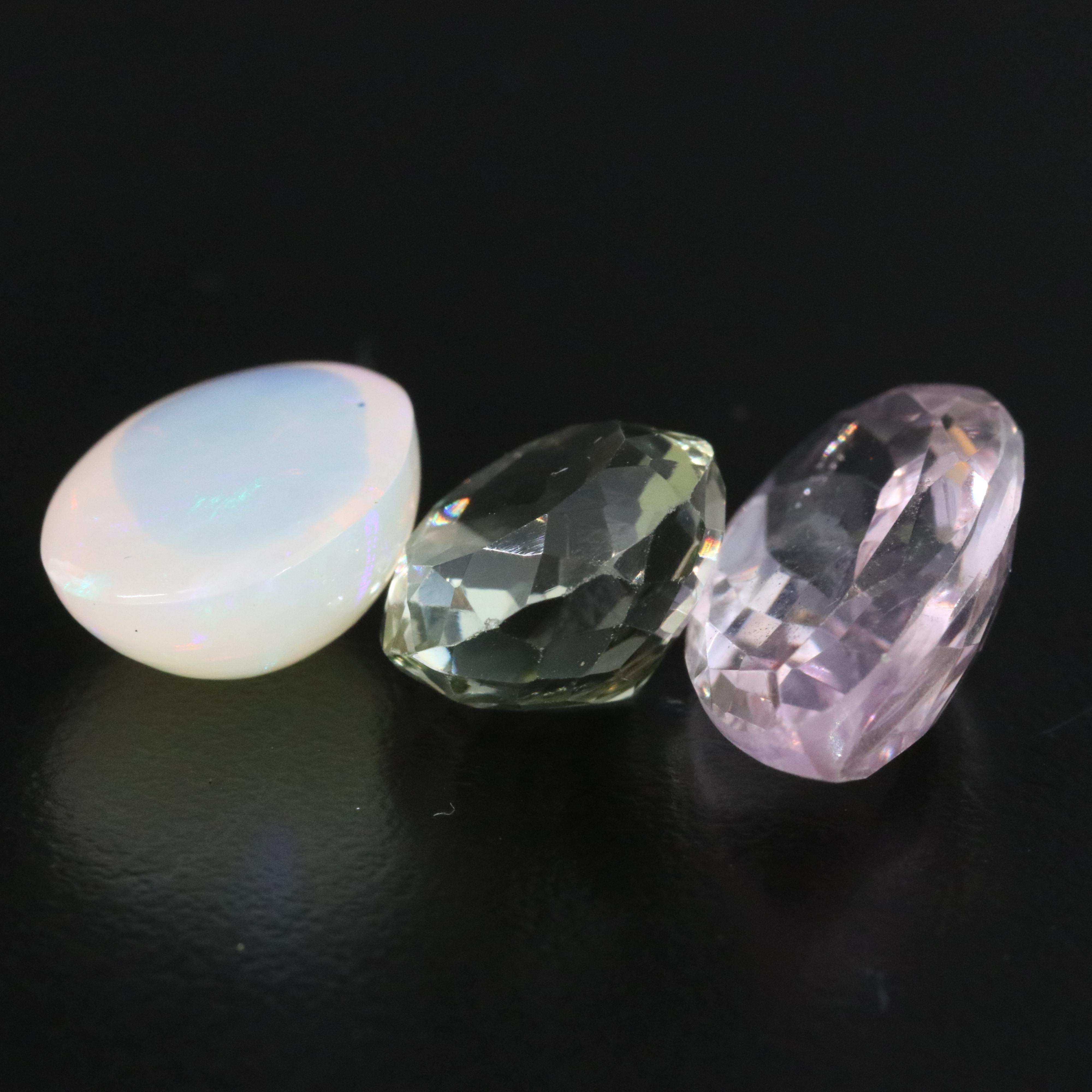 Loose 64.08 CTW Gemstones Featuring Amethyst, Citrine and Opal