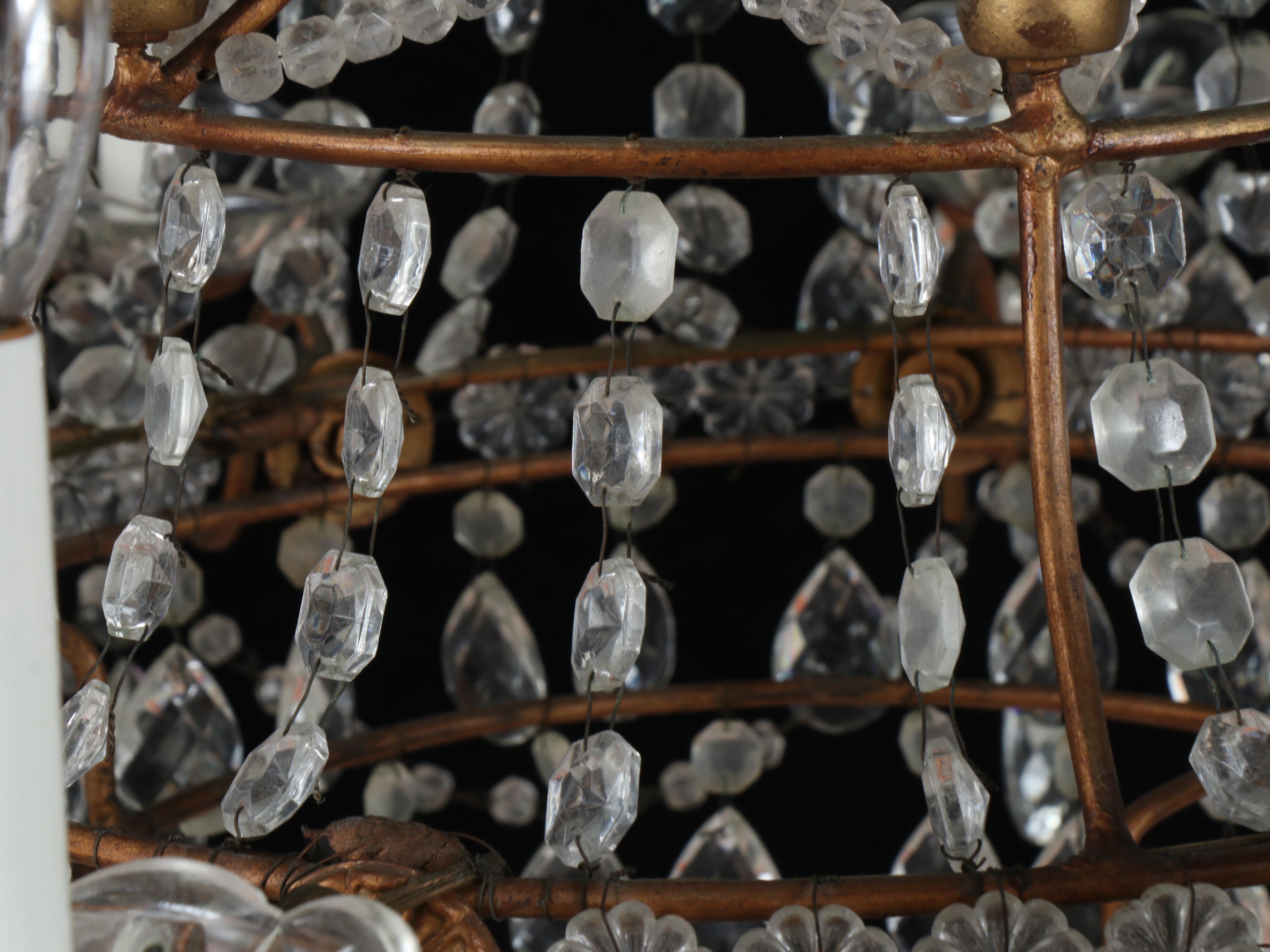 Italian Rococo Style Brass and Crystal Eight-Arm Chandelier