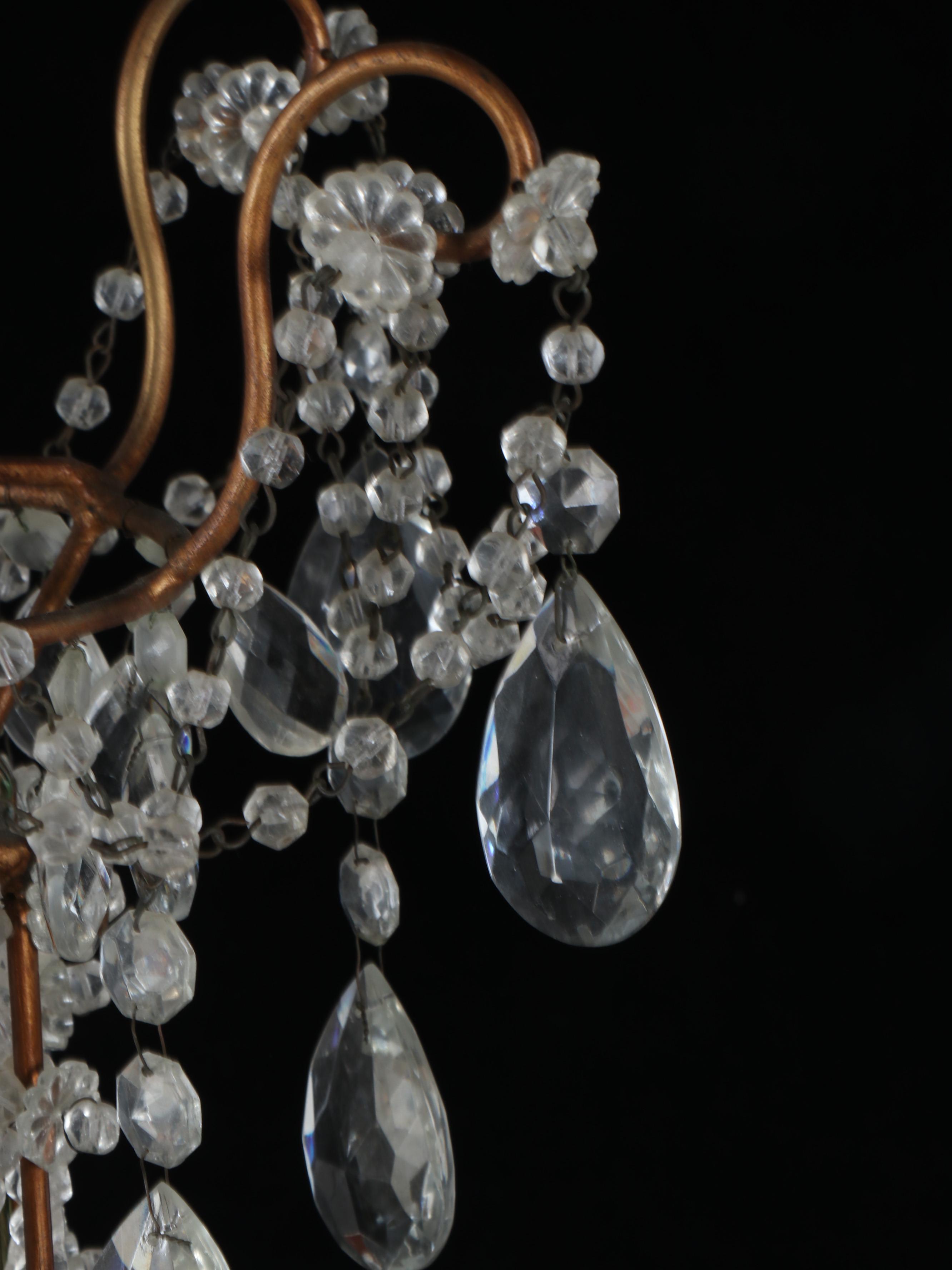 Italian Rococo Style Brass and Crystal Eight-Arm Chandelier