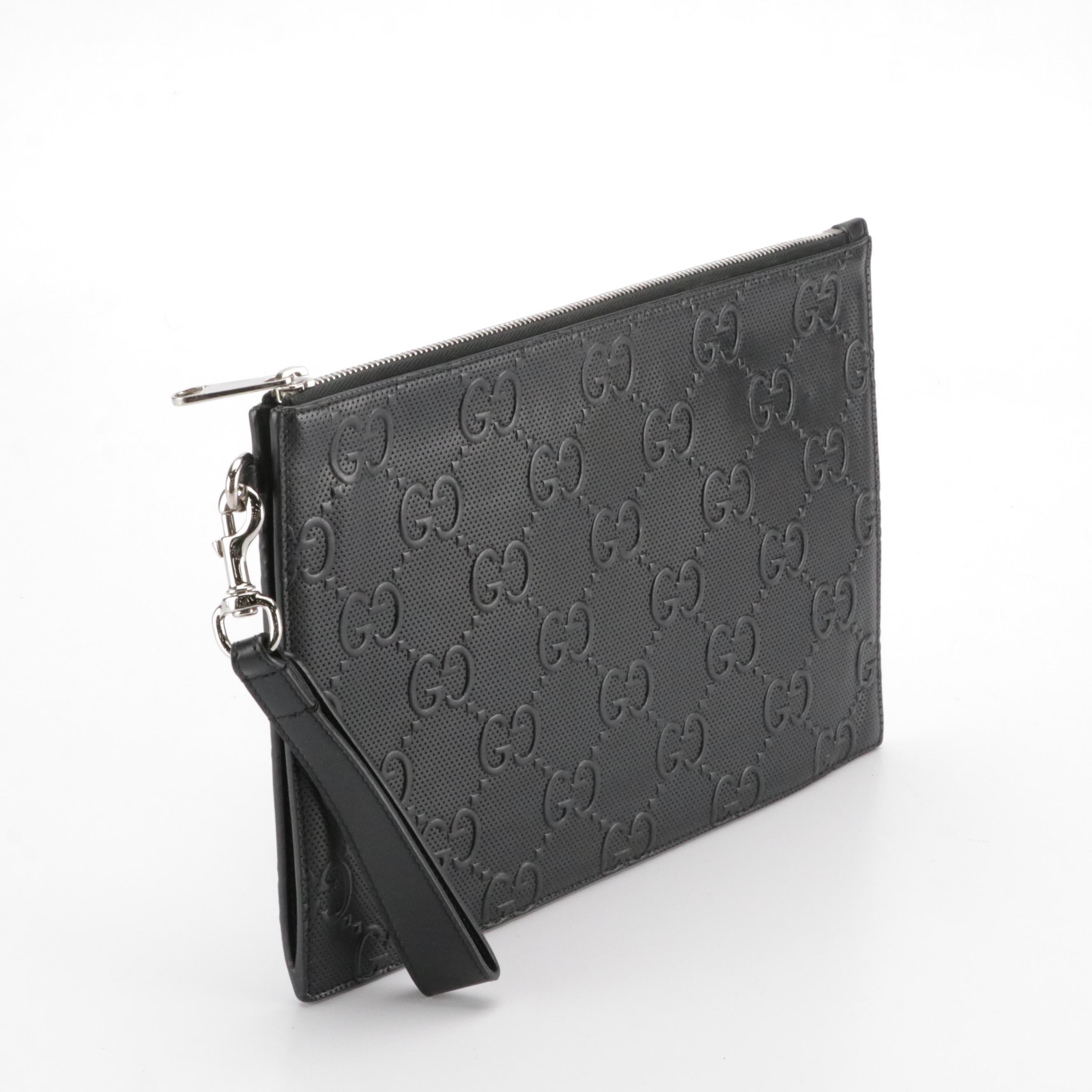 Gucci Zip Wristlet Clutch in Black Perforated GG Embossed Leather