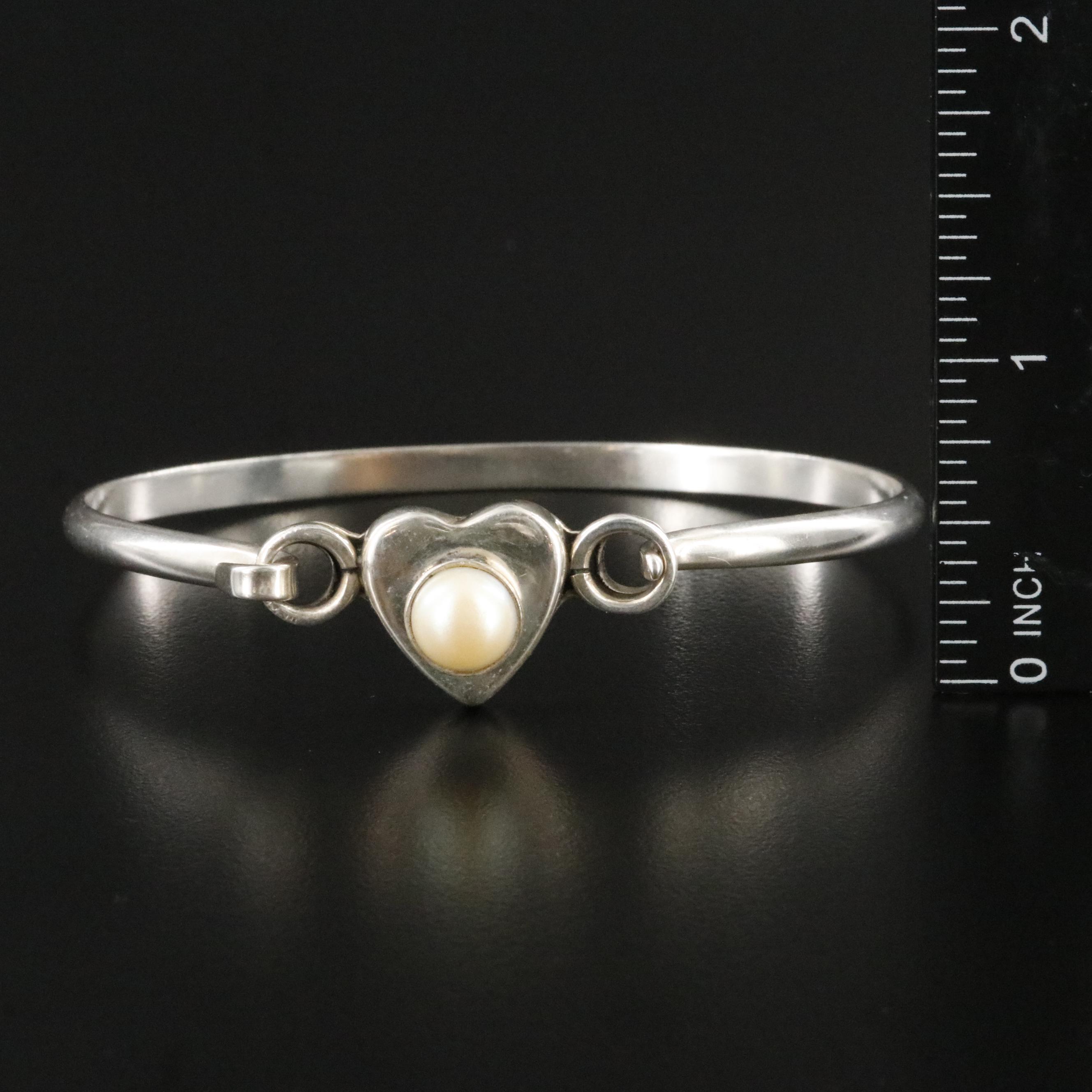 Sterling, Jadeite and Topaz Featured in Jewelry Collection