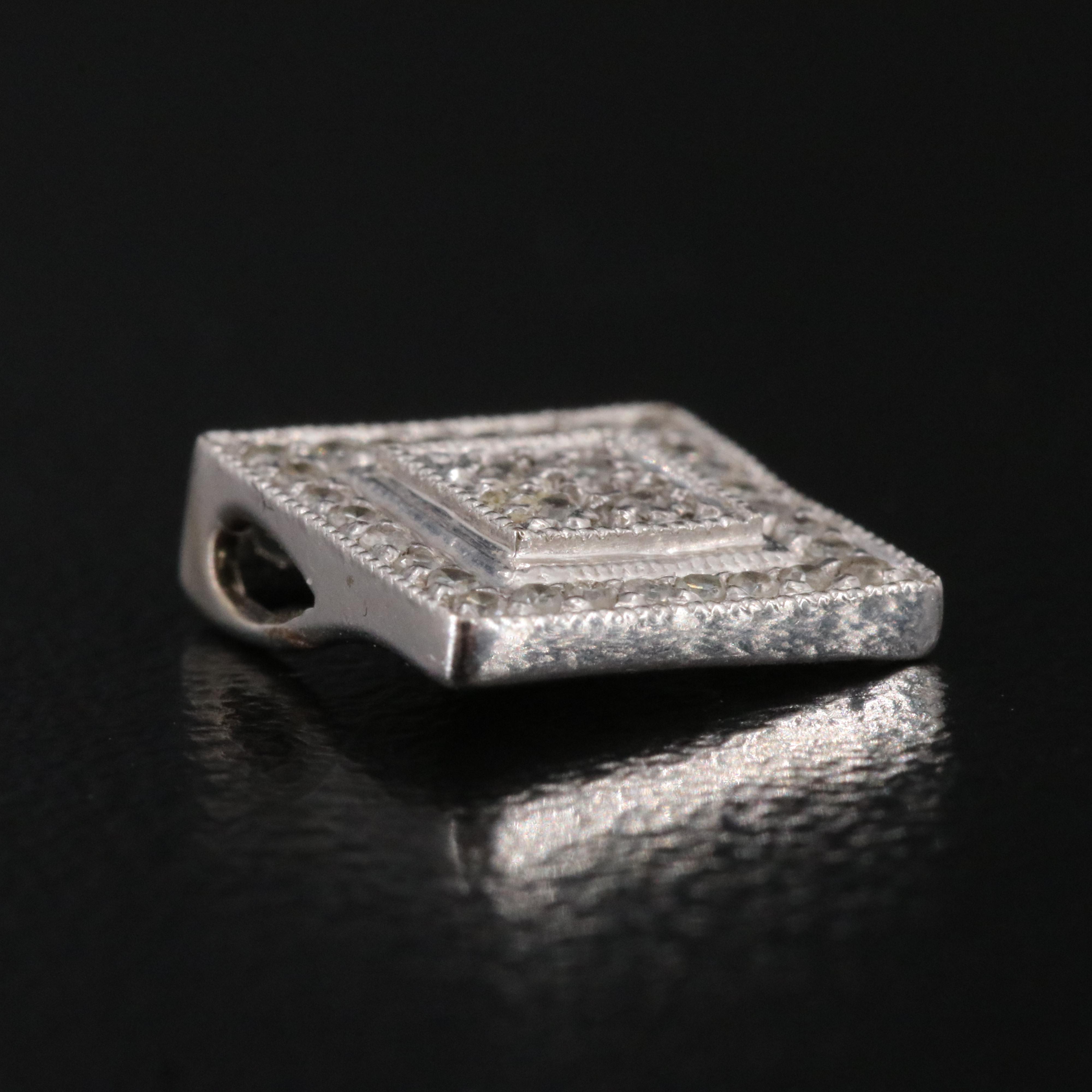 14K 0.09 CTW Diamond Pendant