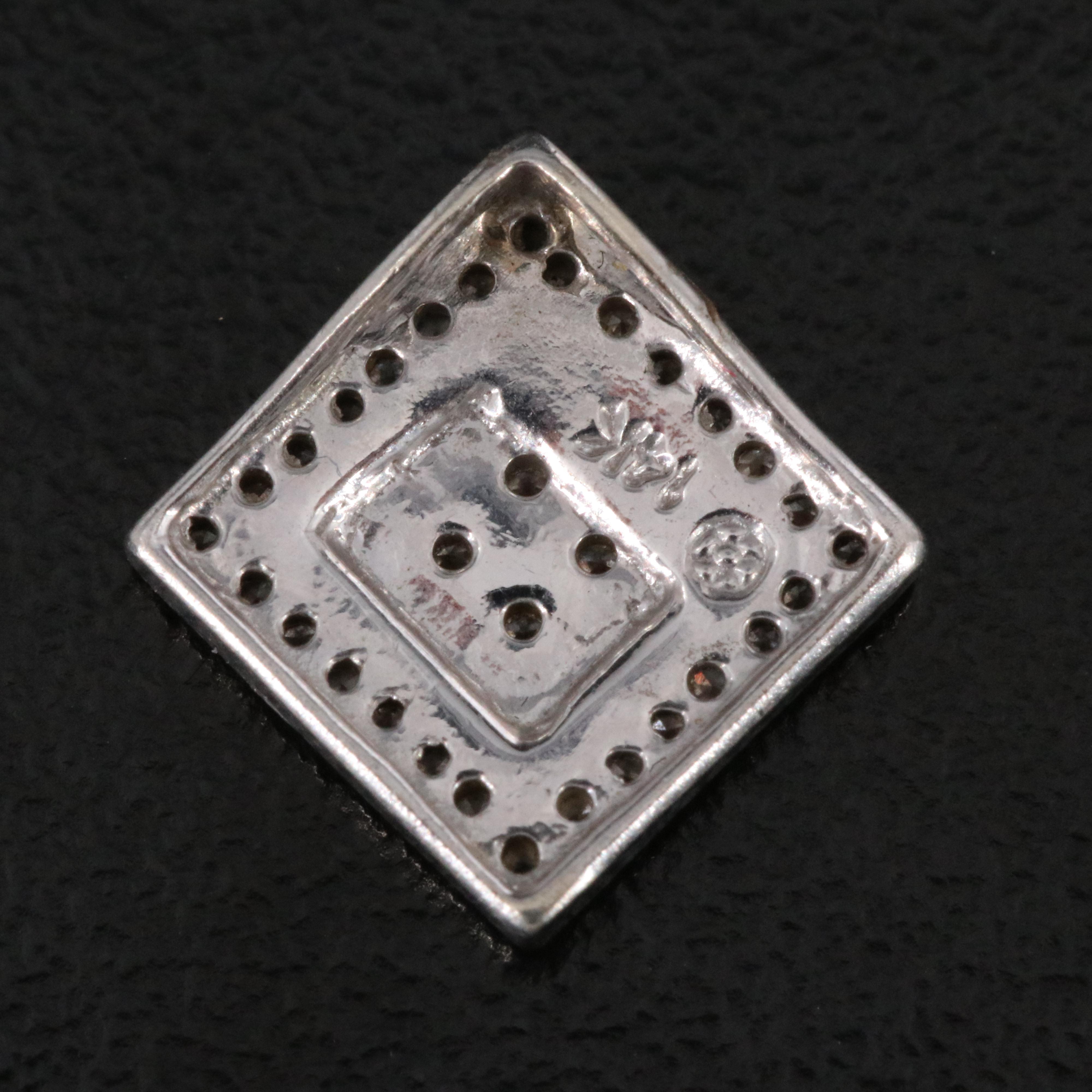 14K 0.09 CTW Diamond Pendant