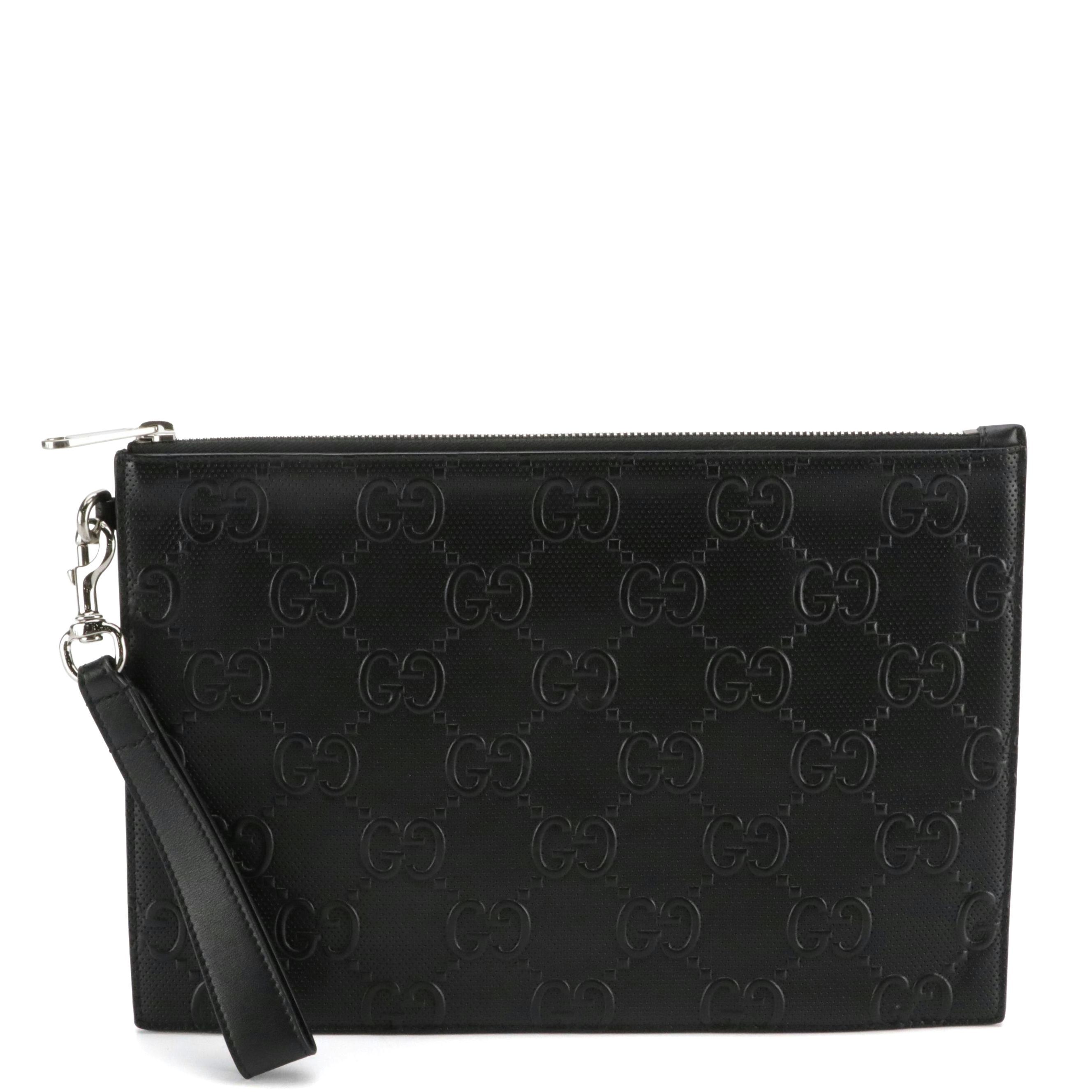 Gucci Zip Wristlet Clutch in Black Perforated GG Embossed Leather