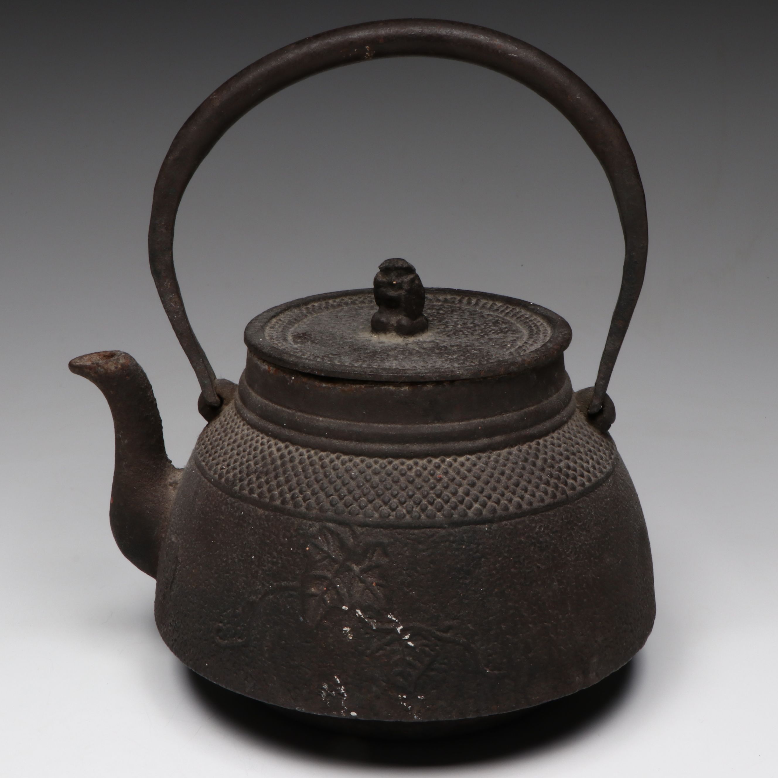 Cast Iron Teapot with Porcelain Cups and Wood Stand