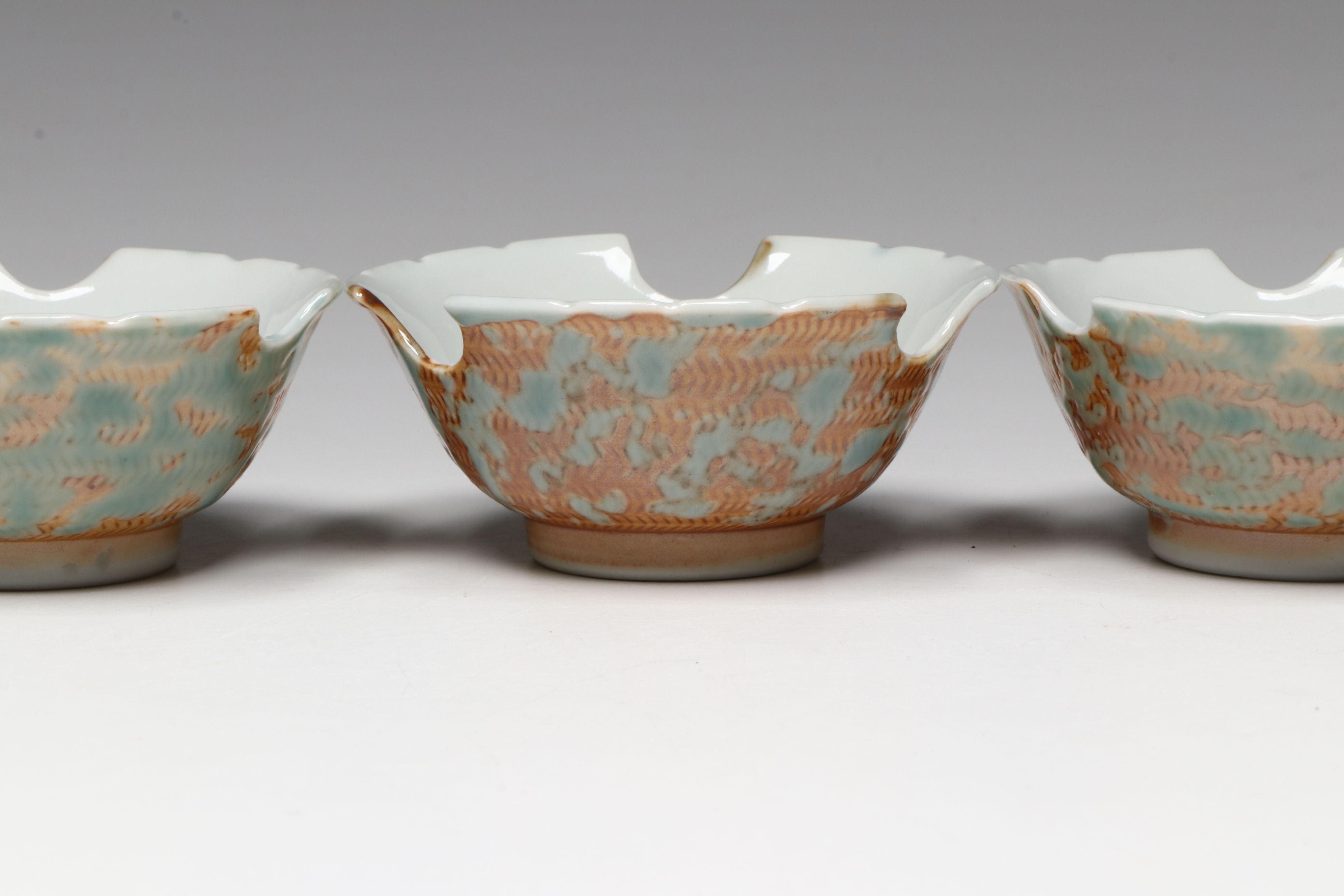 Cast Iron Teapot with Porcelain Cups and Wood Stand