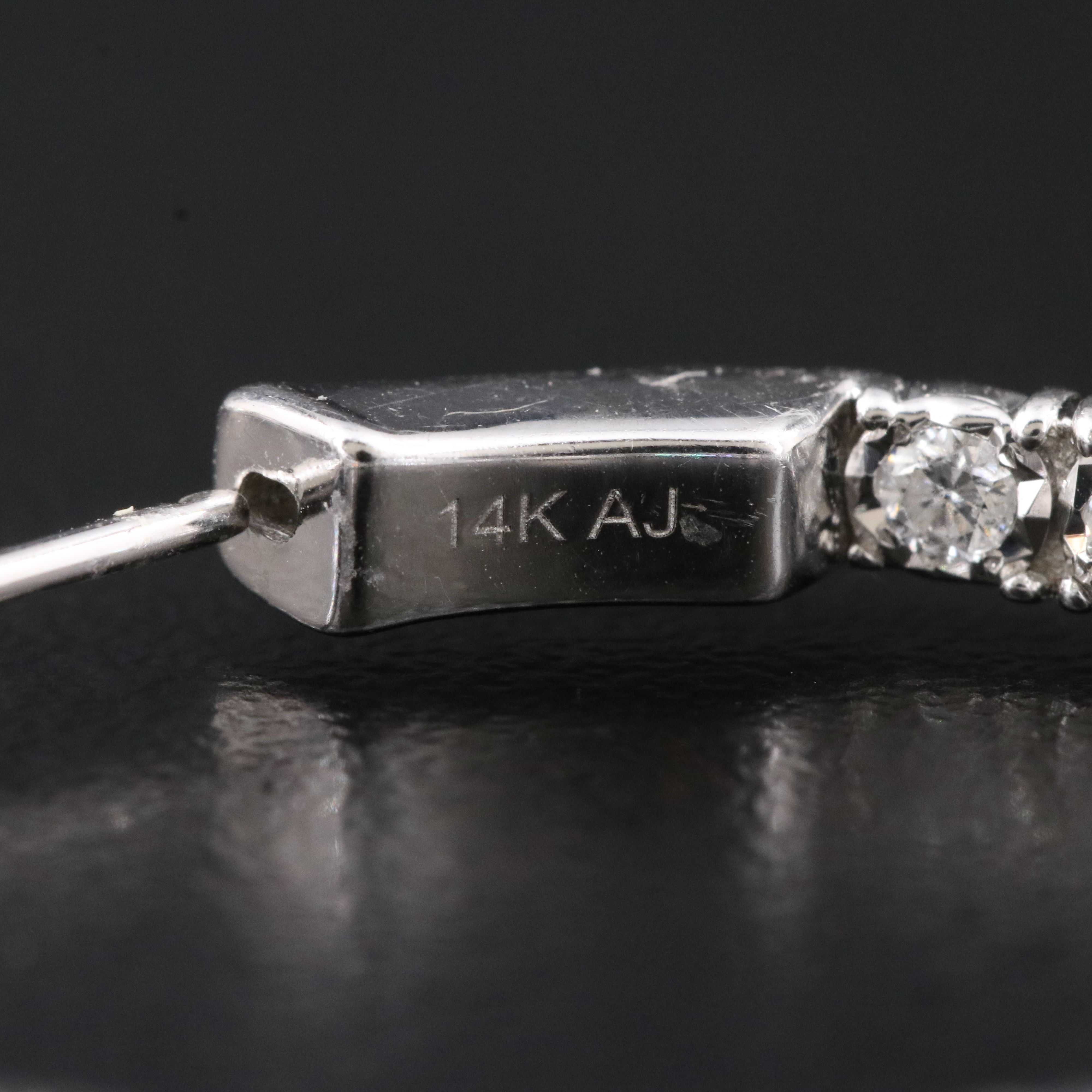 14K 1.50 CTW Diamond Inside-Out Hoop Earrings