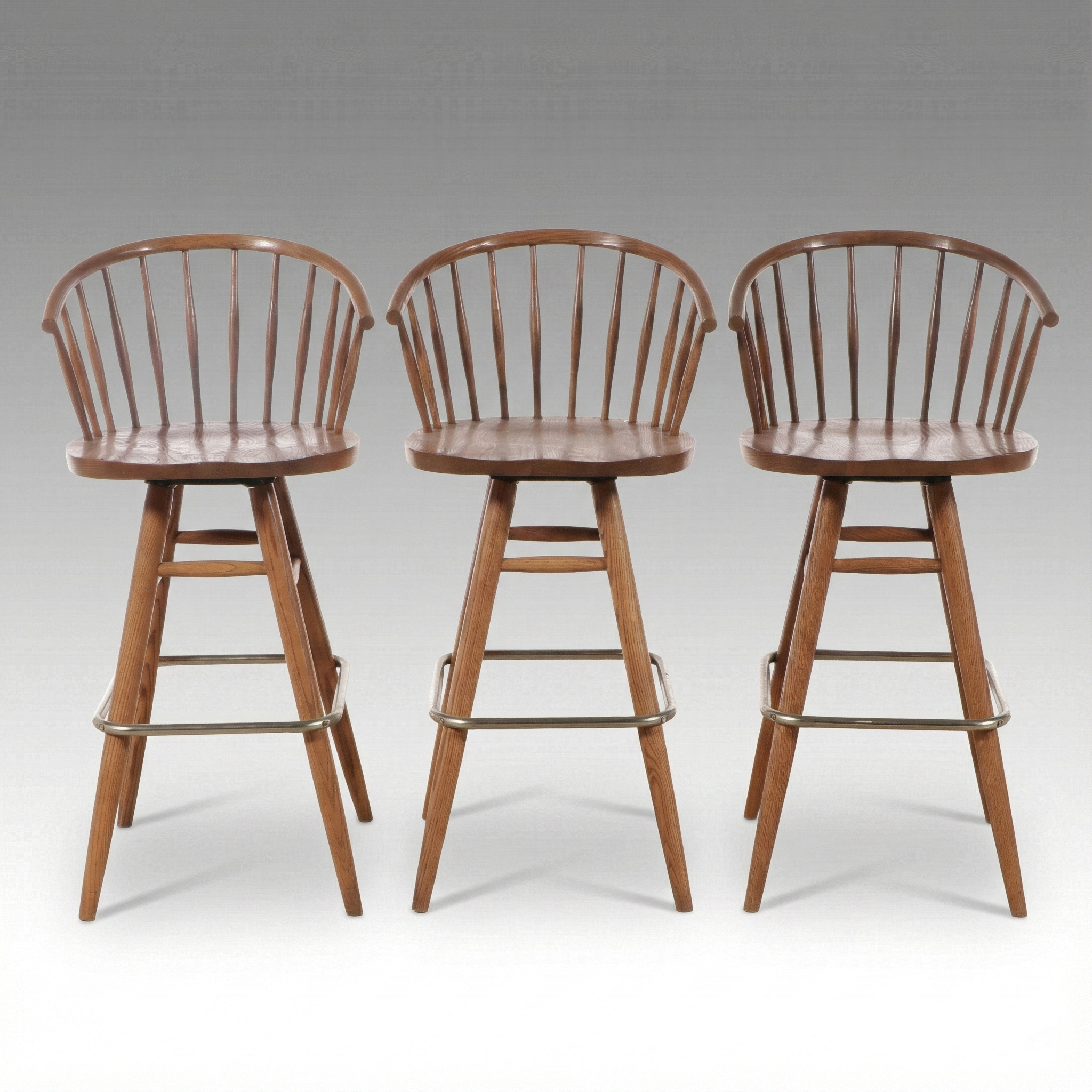 Set of Three Mid Century Modern Style Oak Spindle and Barrel-Back Stools