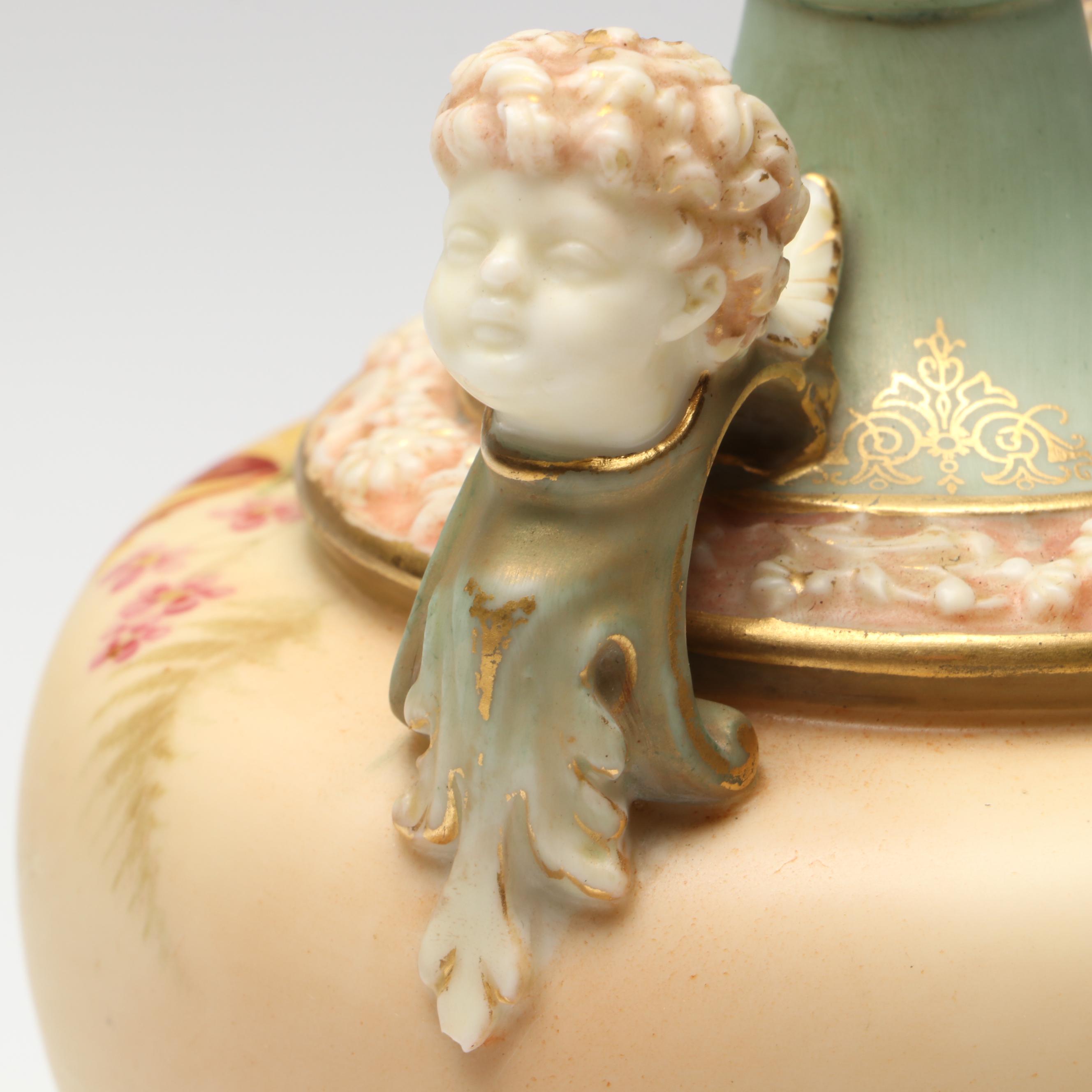 Royal Worcester Blush Ivory Porcelain Bud Vase with Cupid Head Handles