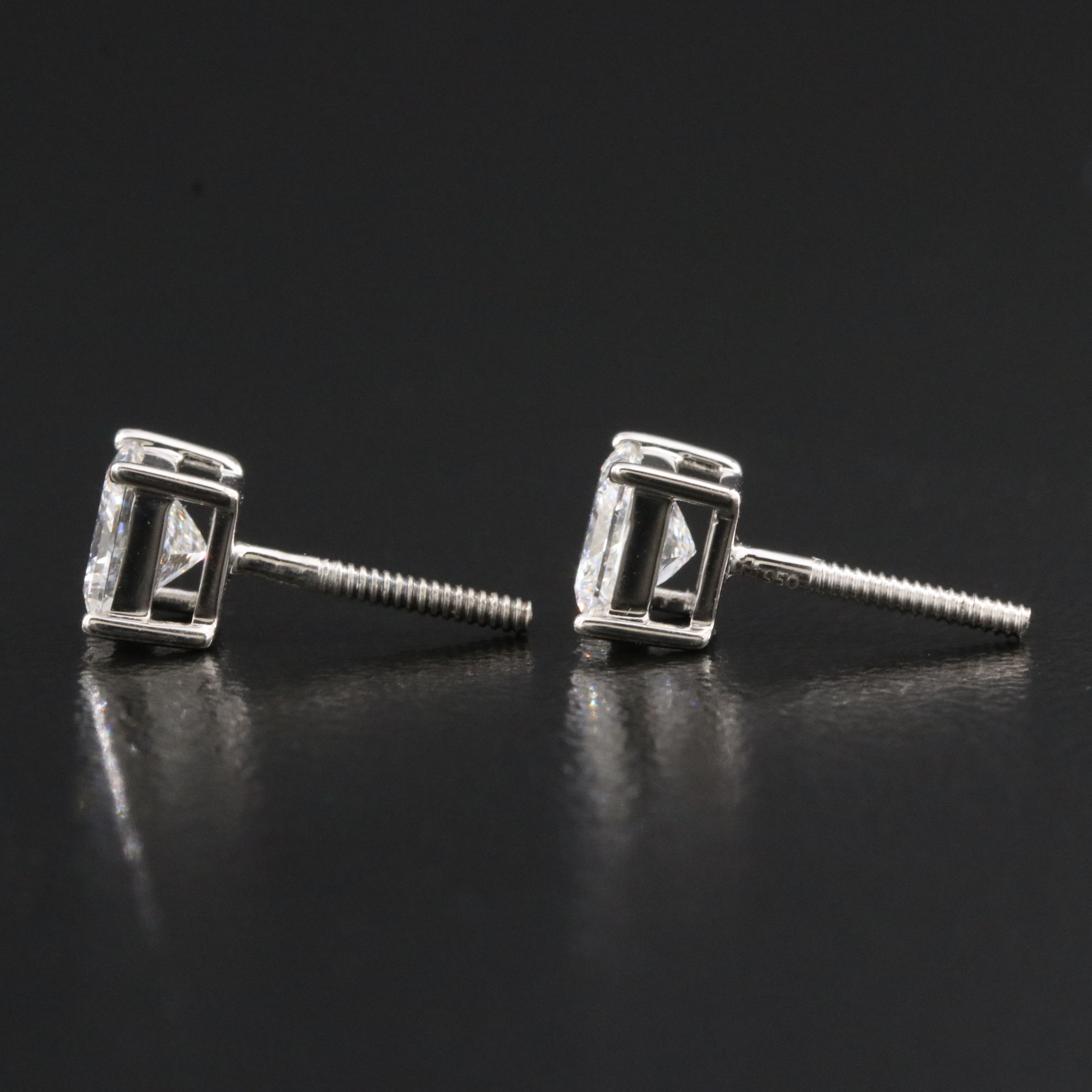 Platinum 1.02 CTW Diamond Stud Earrings with GIA Reports