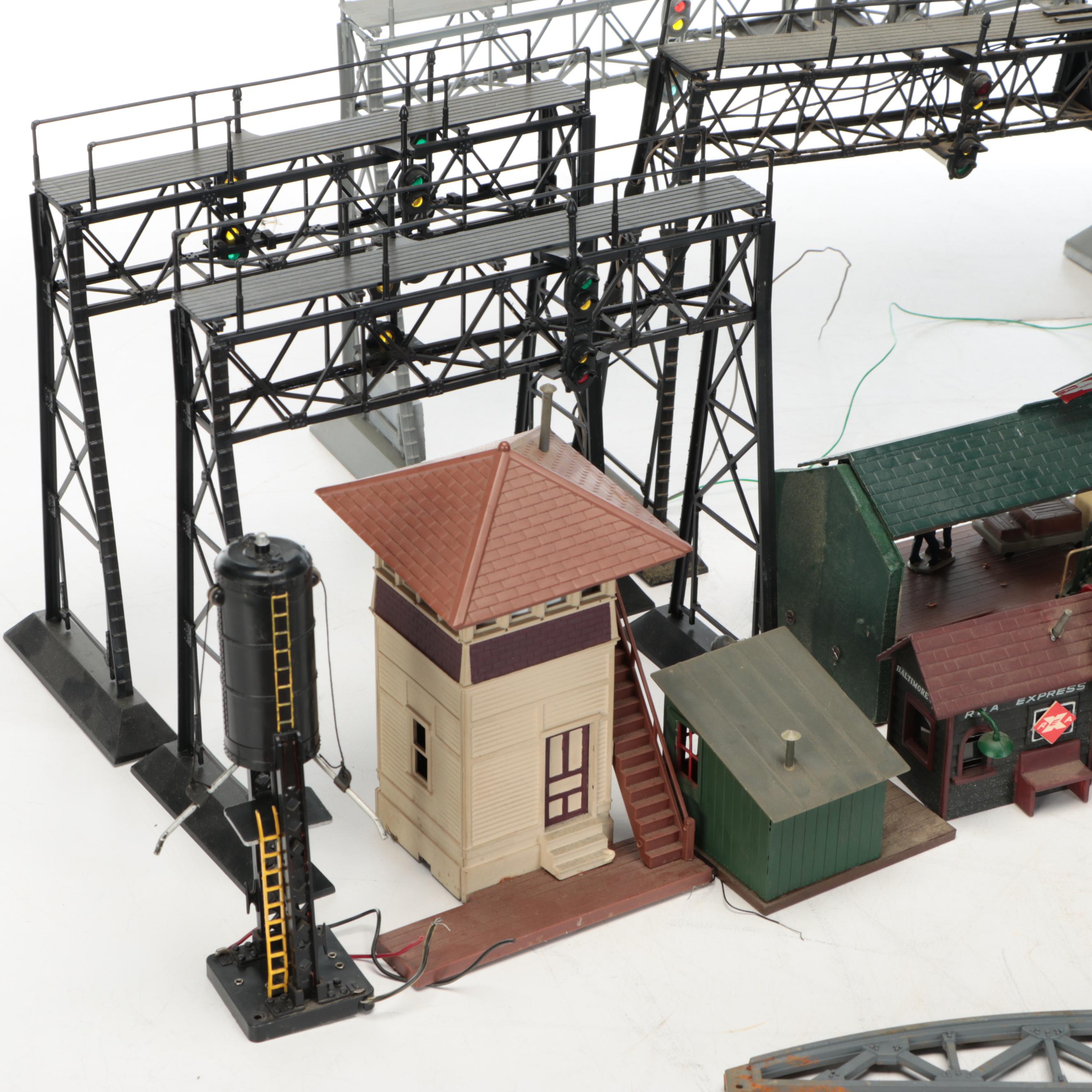 Miniature Railroad Station and Loading Area Features with "Old Trains" Wood Sign