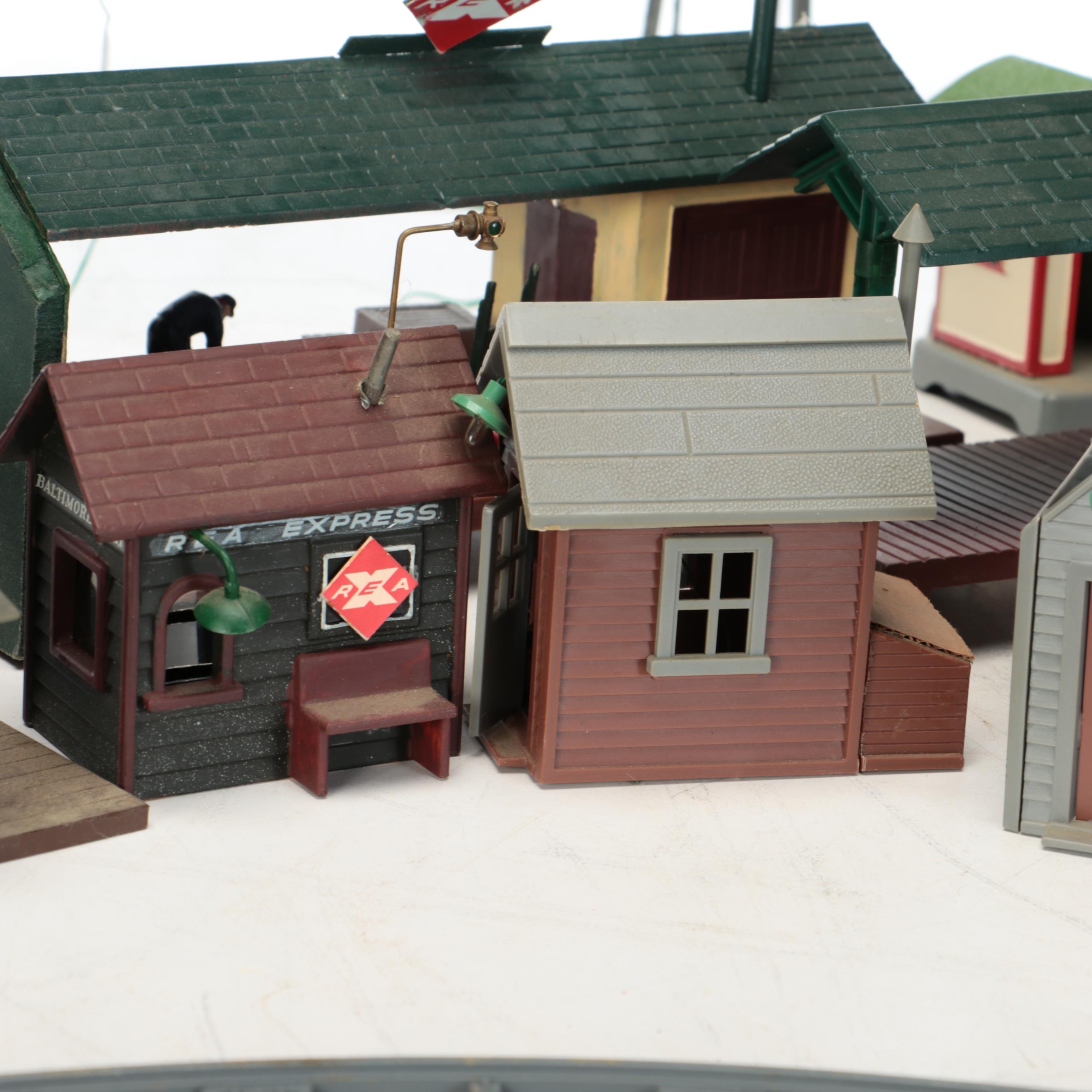 Miniature Railroad Station and Loading Area Features with "Old Trains" Wood Sign