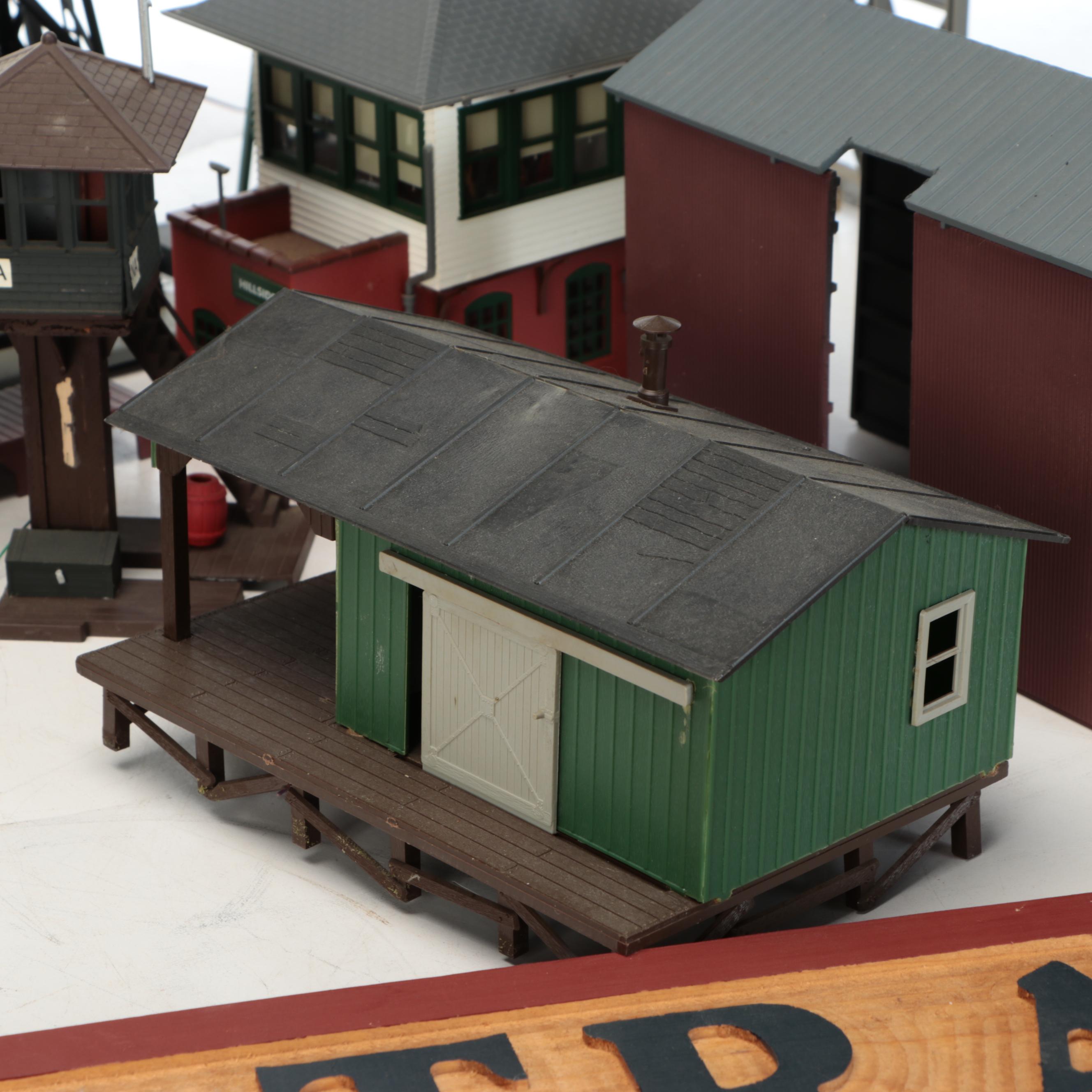 Miniature Railroad Station and Loading Area Features with "Old Trains" Wood Sign
