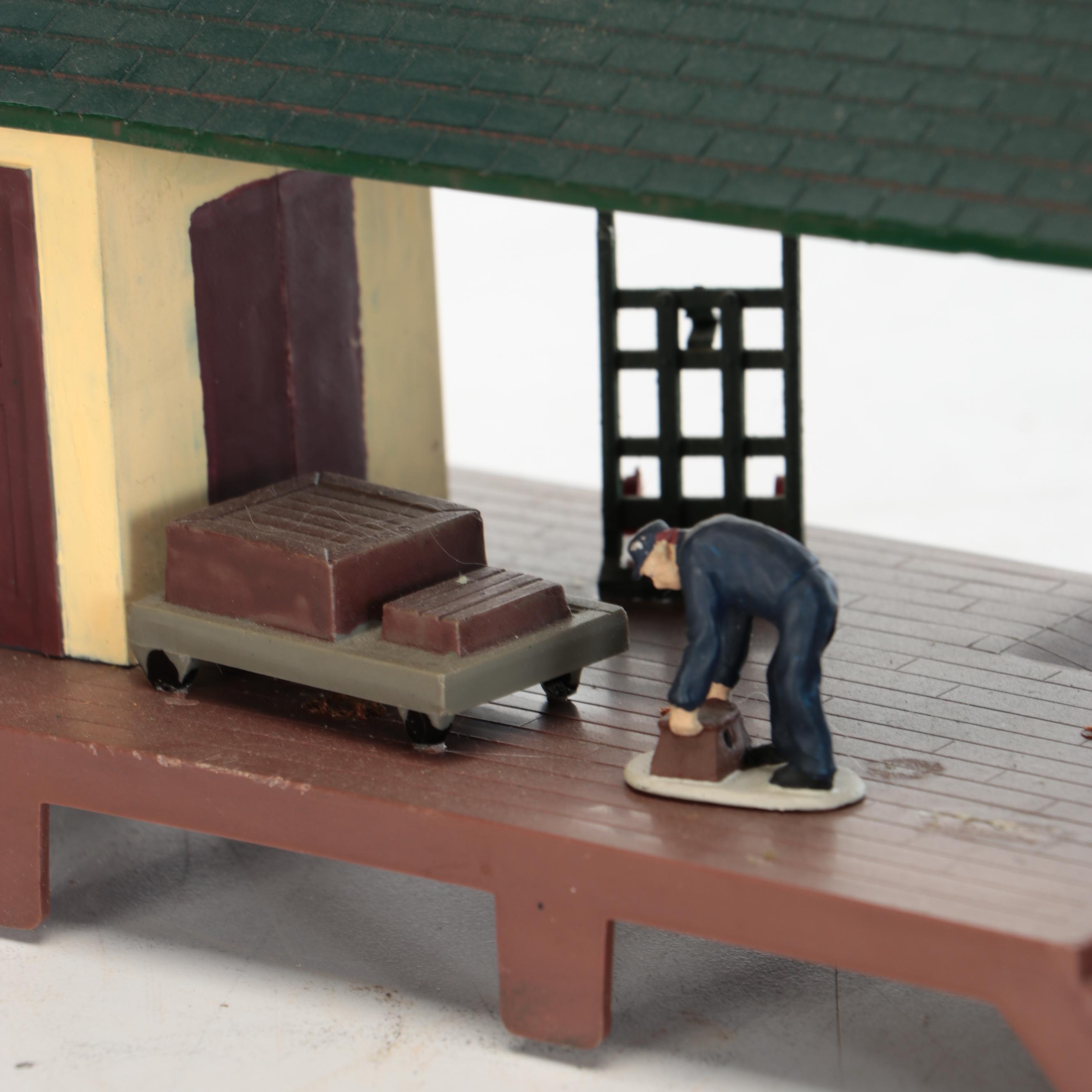 Miniature Railroad Station and Loading Area Features with "Old Trains" Wood Sign