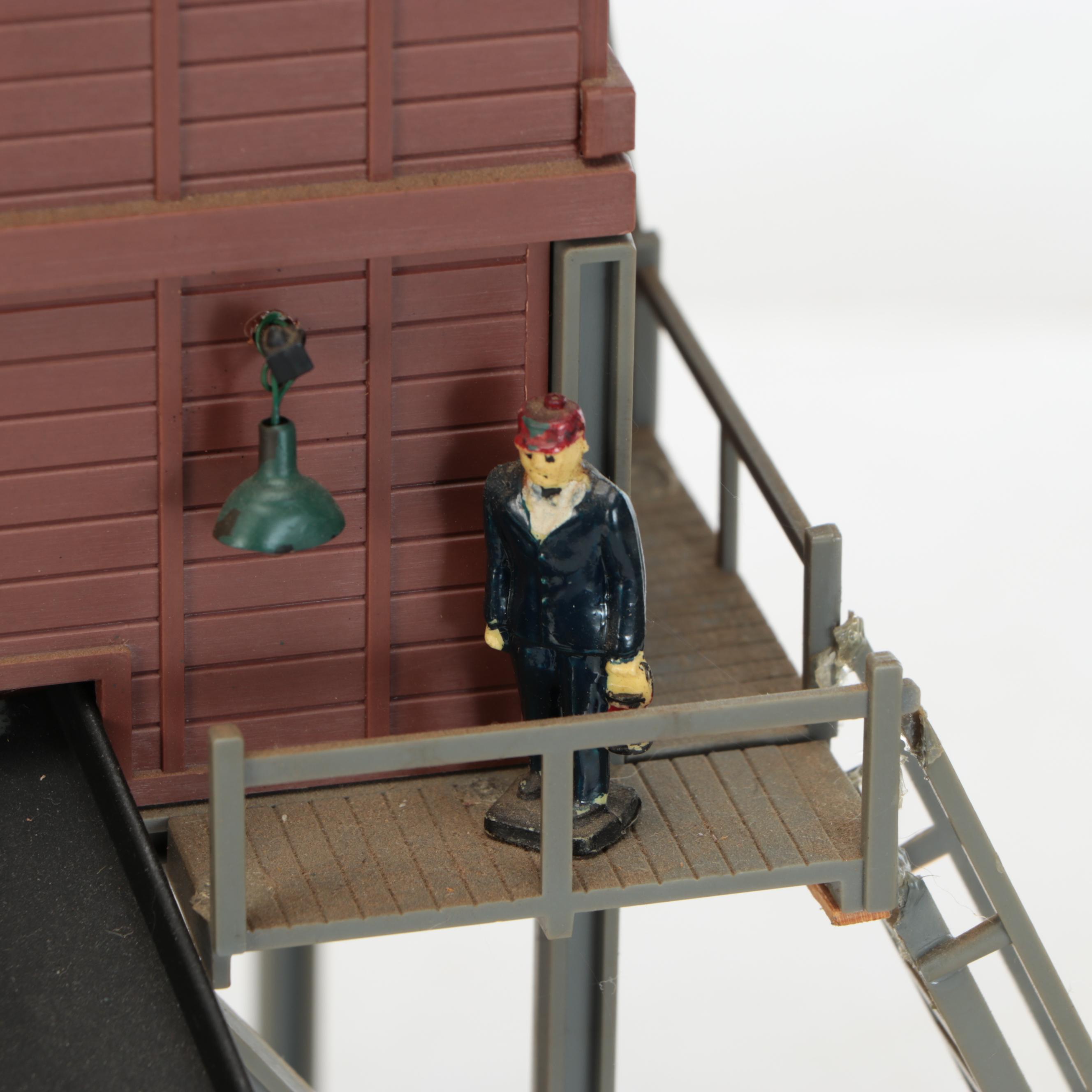 Miniature Railroad Station and Loading Area Features with "Old Trains" Wood Sign